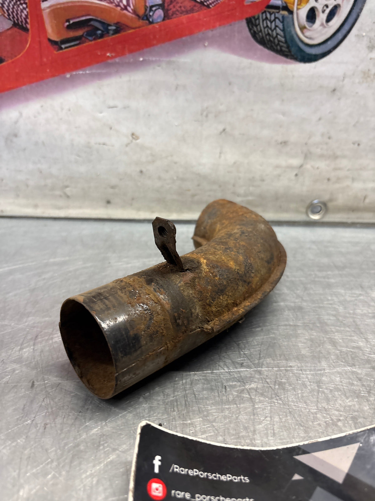 Porsche 914 left side hot air manifold, used PCG256331GRV