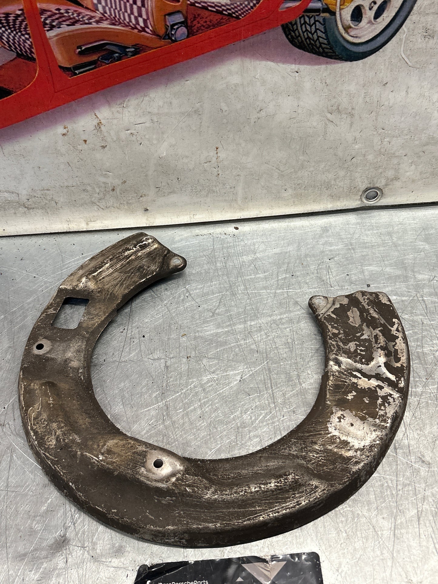 Porsche 928 S4 rear left brake dust cover plate, used 92835281305