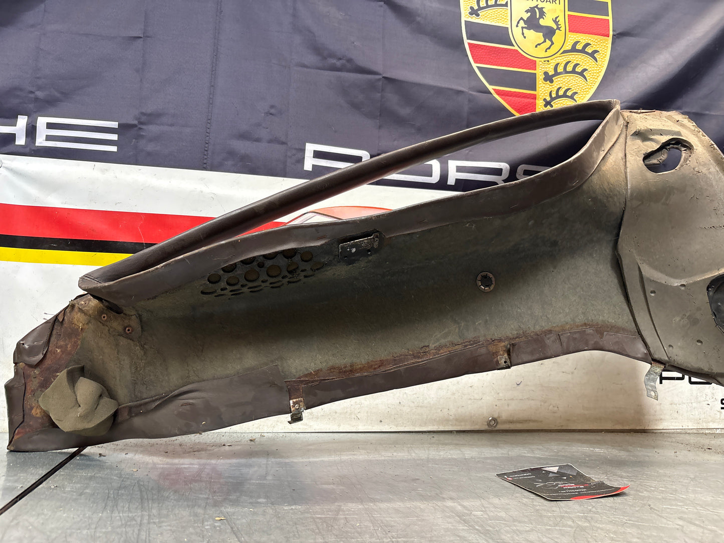 Porsche 928 early right side lower side trim panel, without loudspeaker, brown used 92855502202