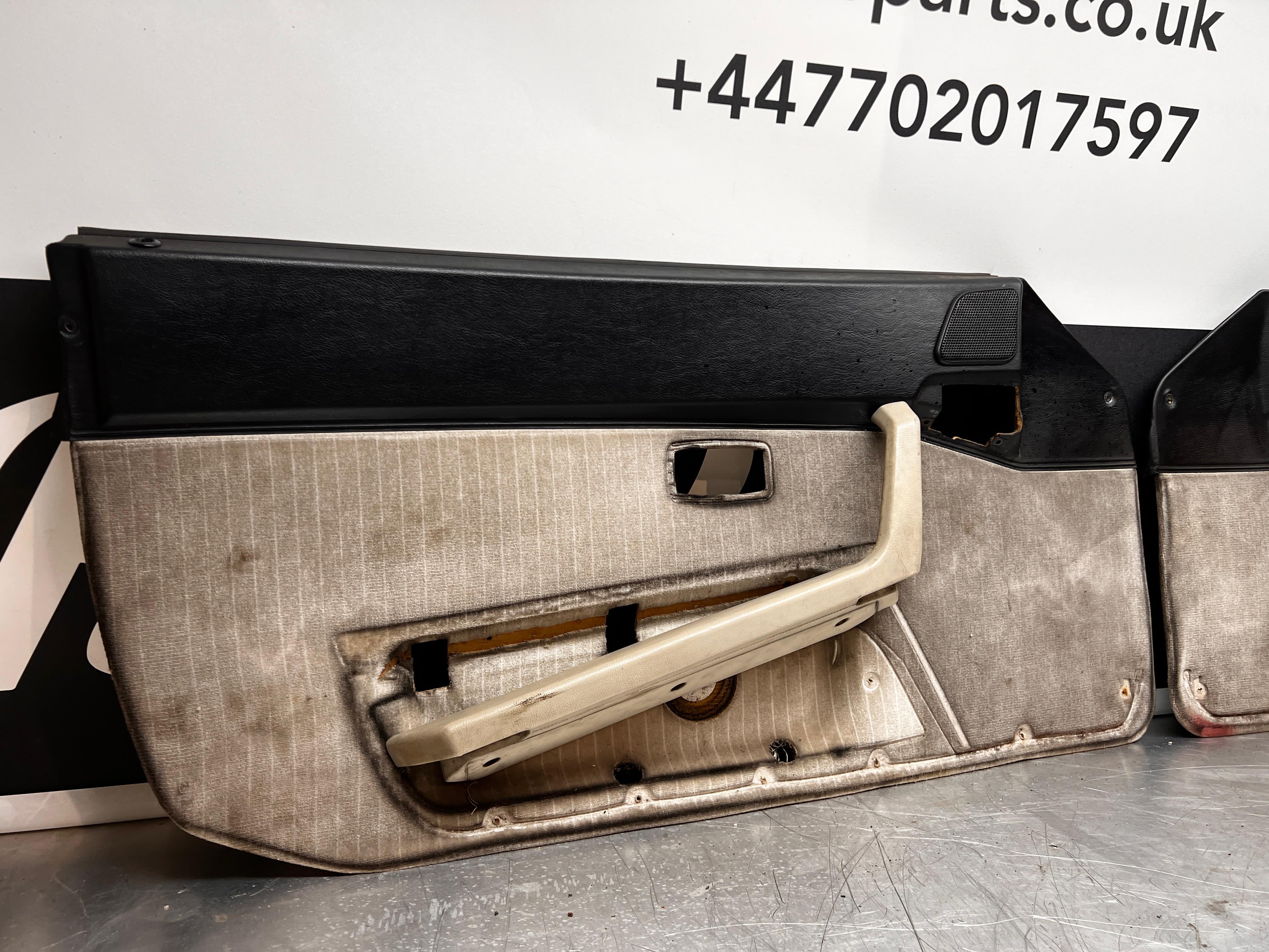 Pair Of Porsche 944 S2 black door cards 944555017 944555018 with