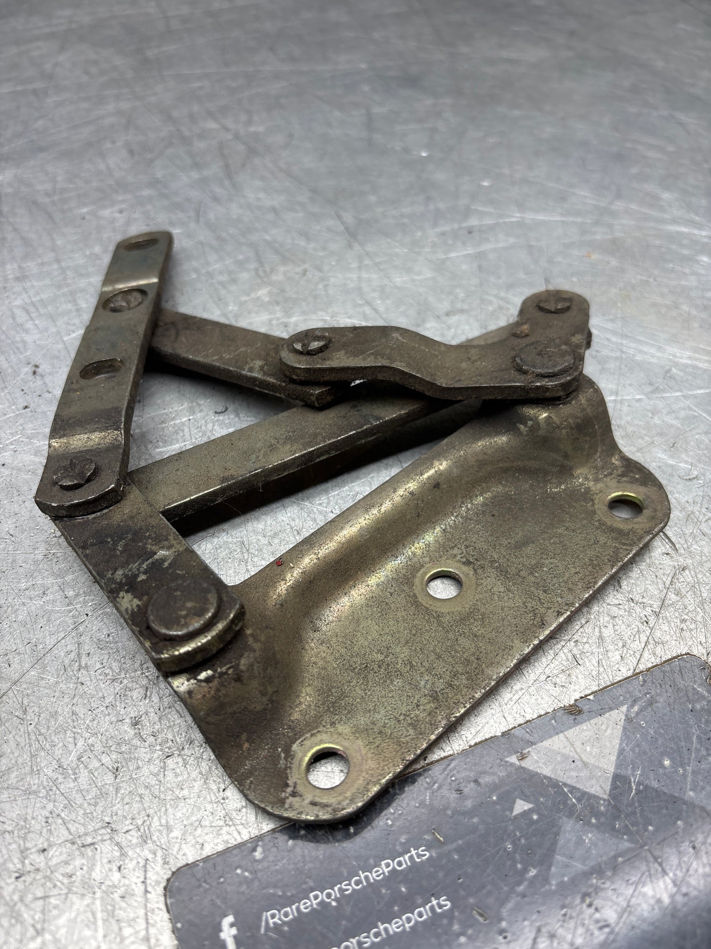 Porsche 928 left hand side bonnet hinge, used 92851104104