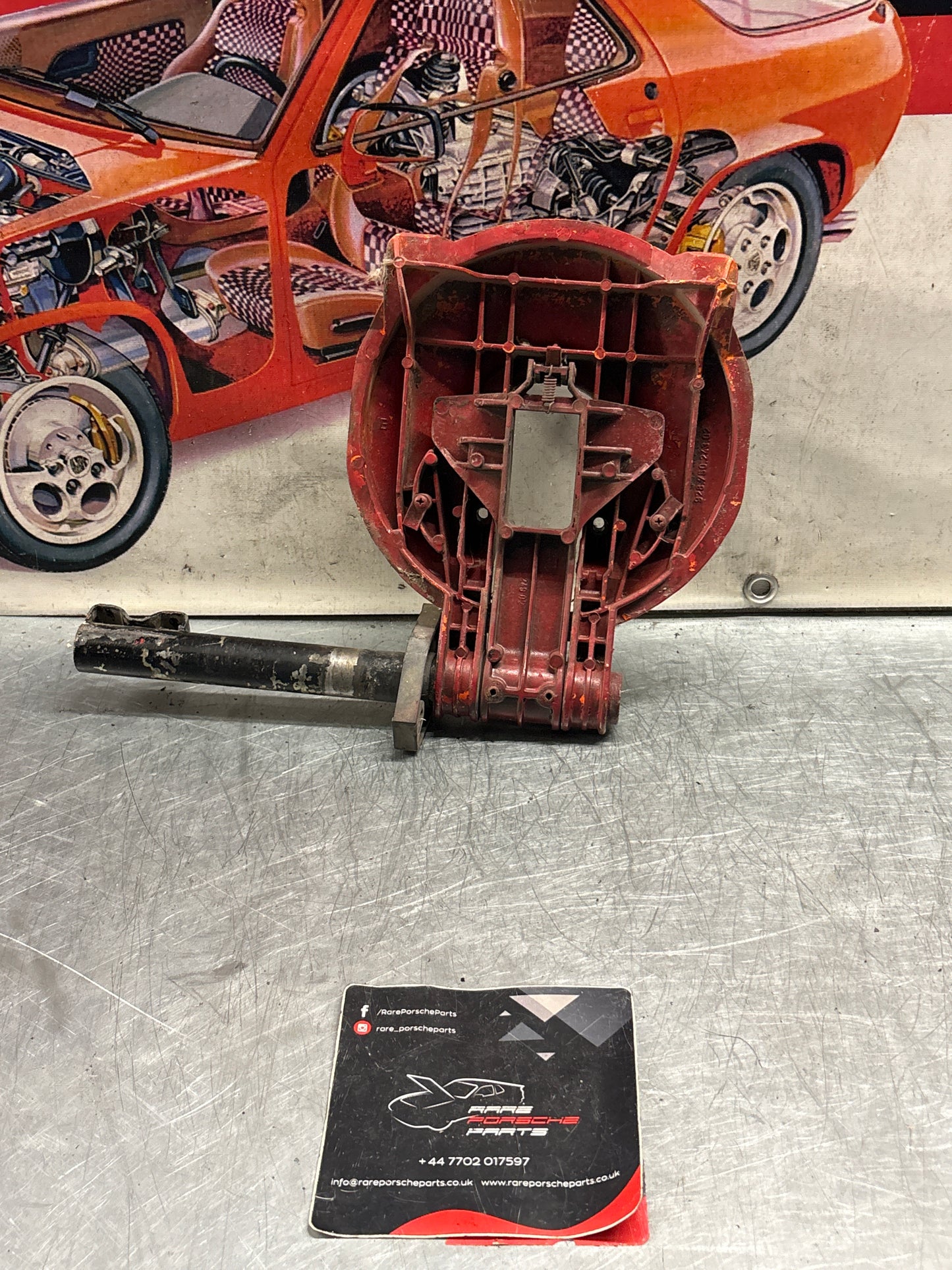 Porsche 928 left headlight swivel frame 92875024902 92875024302 used