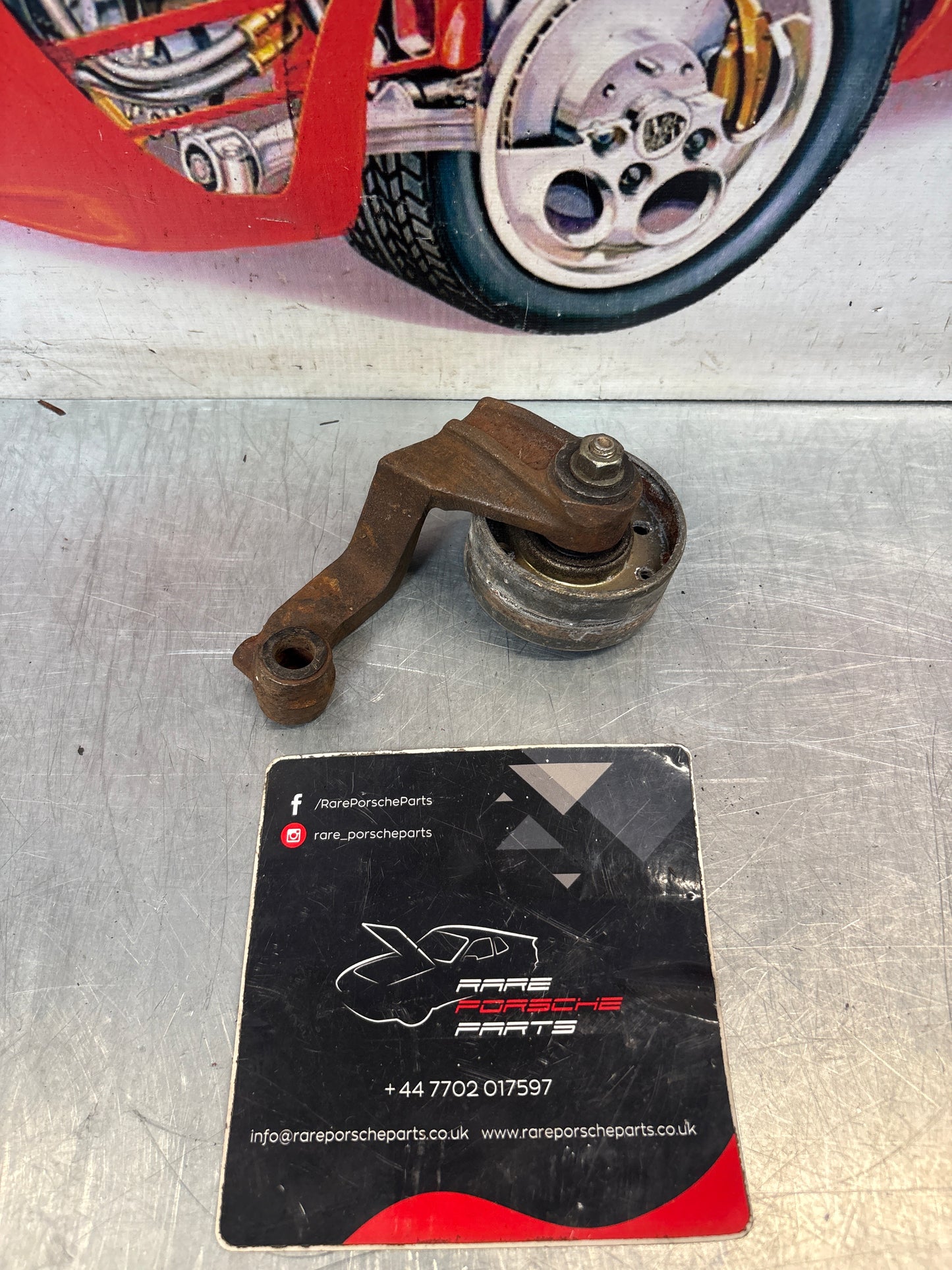 Porsche 928 belt tensioner bracket, used 9281055404R / 92810554004