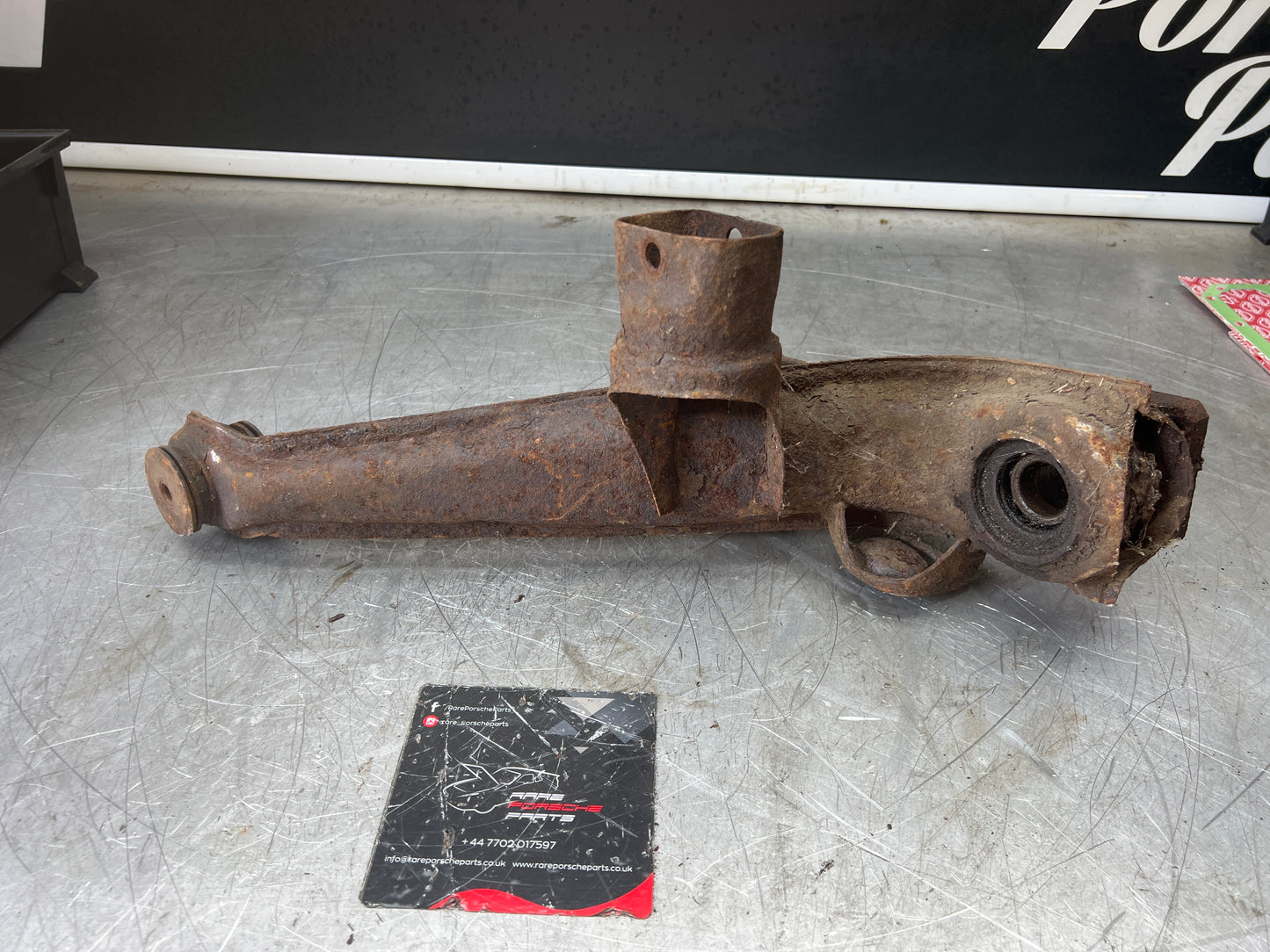 Porsche 924 944  -85.5 Rear left trailing arm, 94433102100