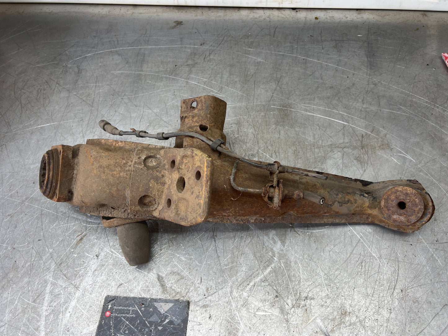 Porsche 924 944  -85.5 Rear left trailing arm, 94433102100