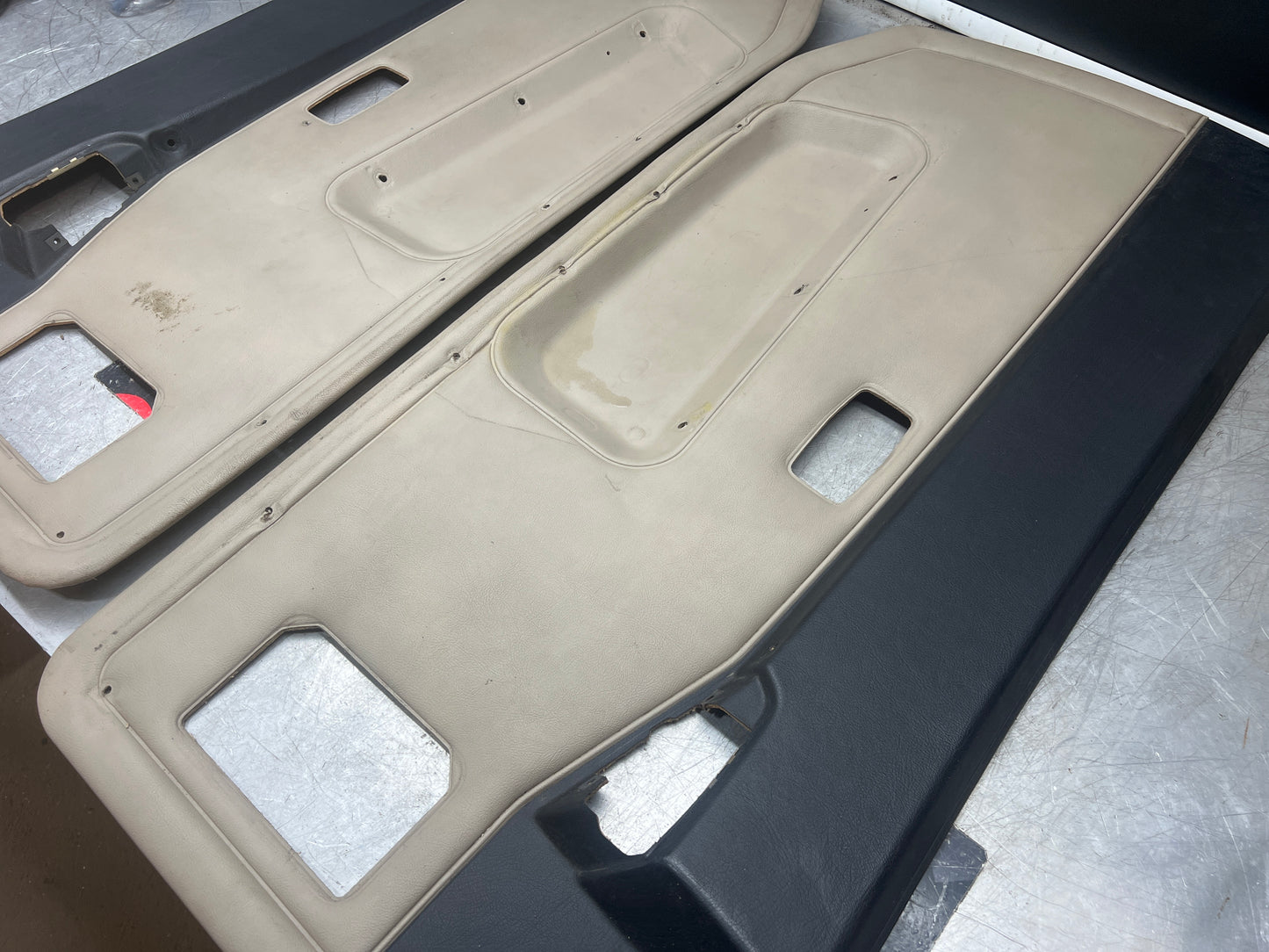 Pair Of Porsche 944 black / cream / white door cards 94455501701 94455501801 used, nice condition.