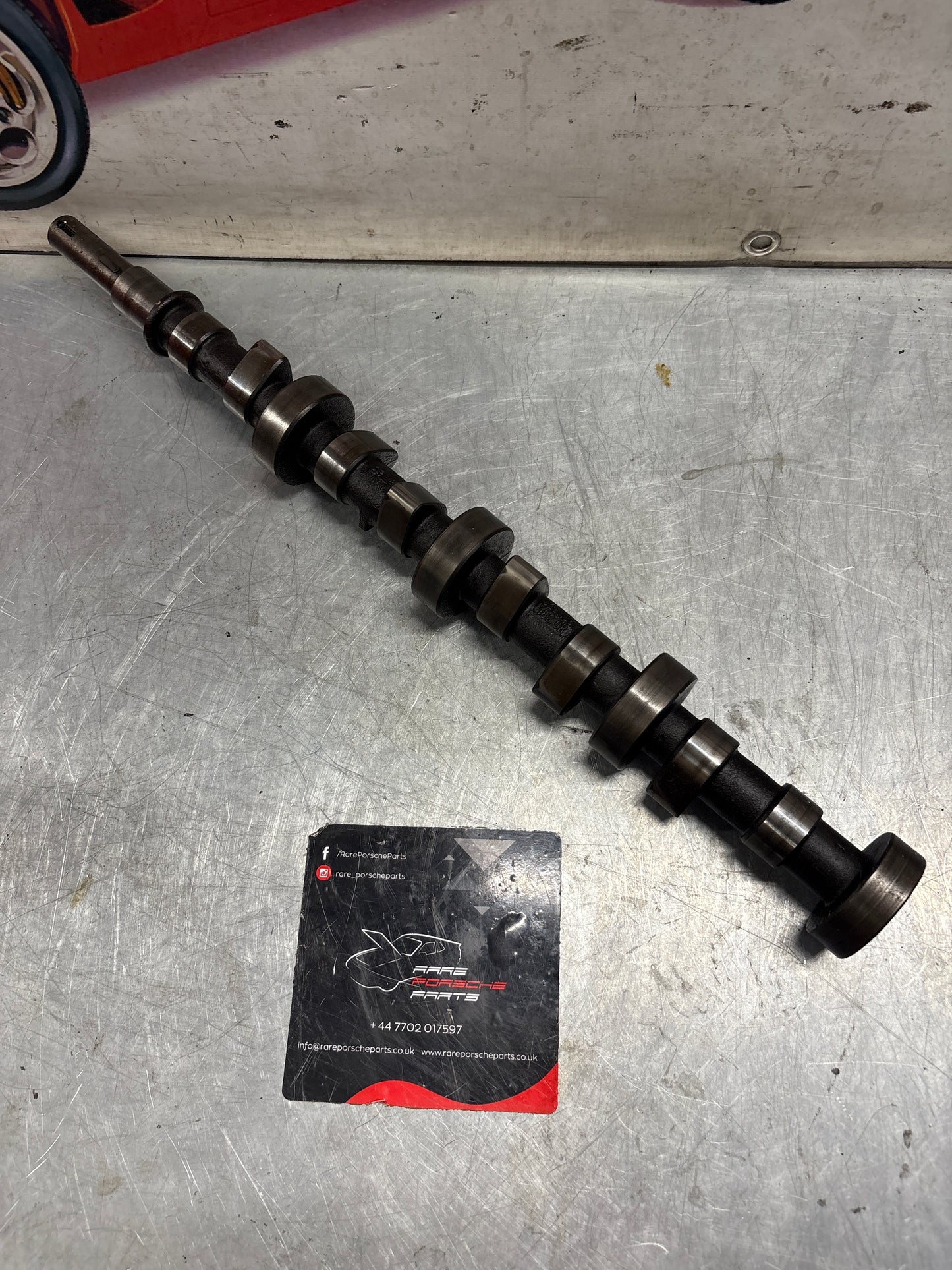 Porsche 928 cam shaft, used 9281051870R