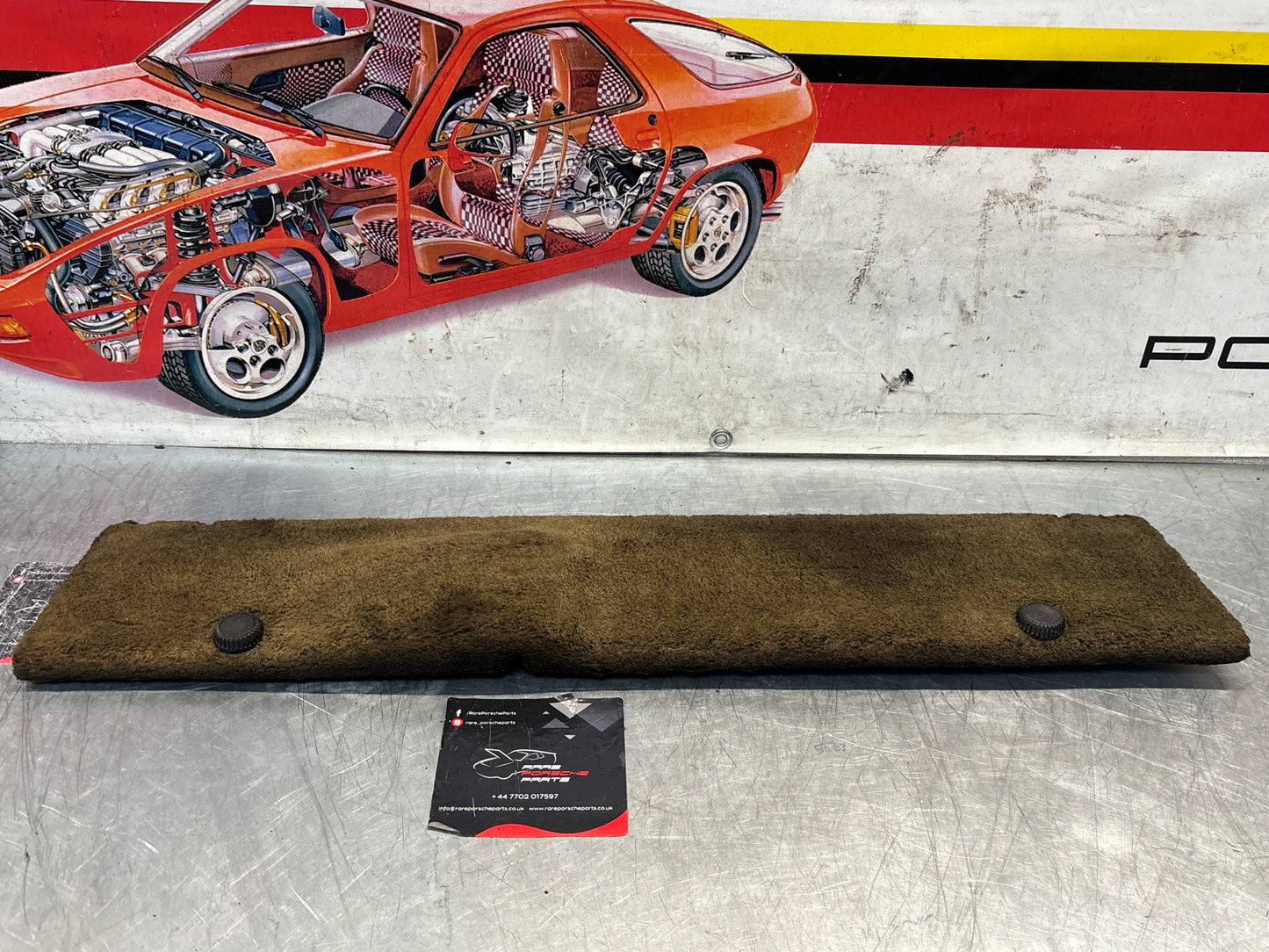 Porsche 928 black/grey-beige carpeted Tool kit panel cover, used 92855118105