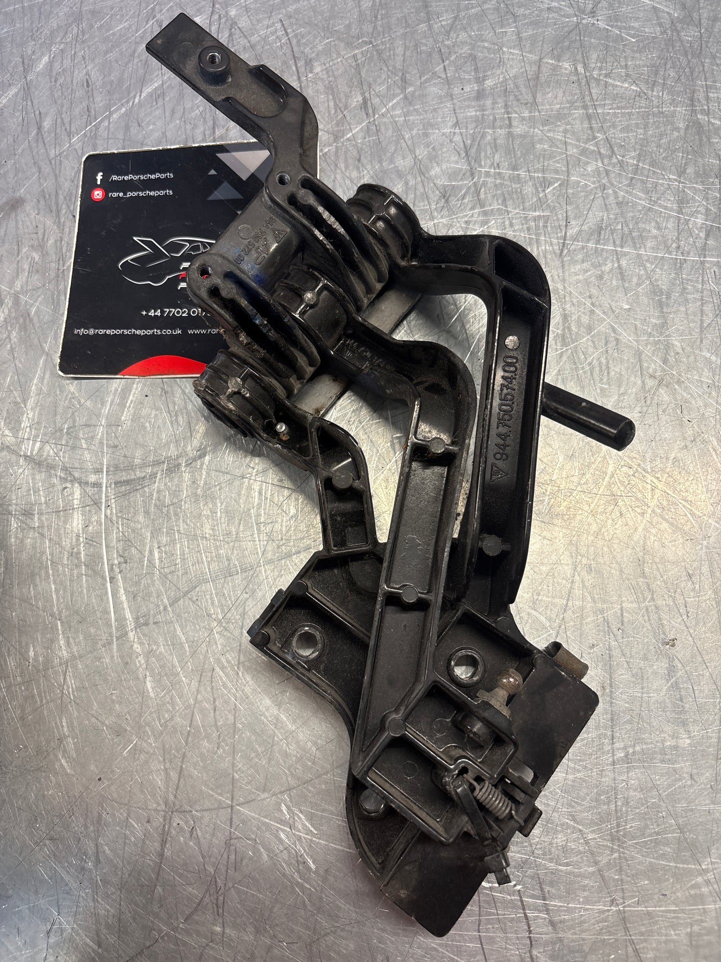Porsche 968 right headlight swivel frame, used 94475057200 / 94475057400 / 94475037800