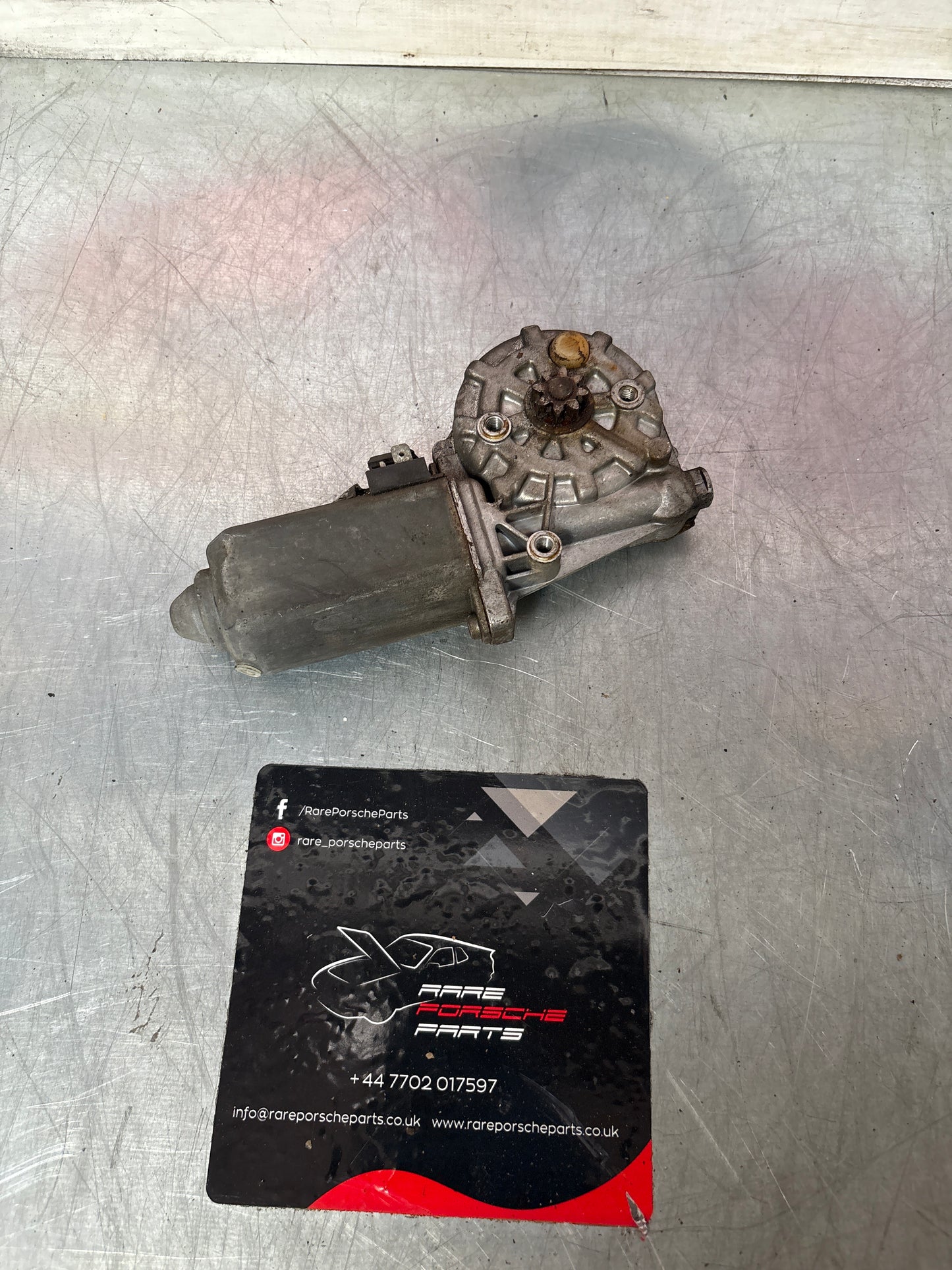Porsche 911 left window motor, used 0130821064