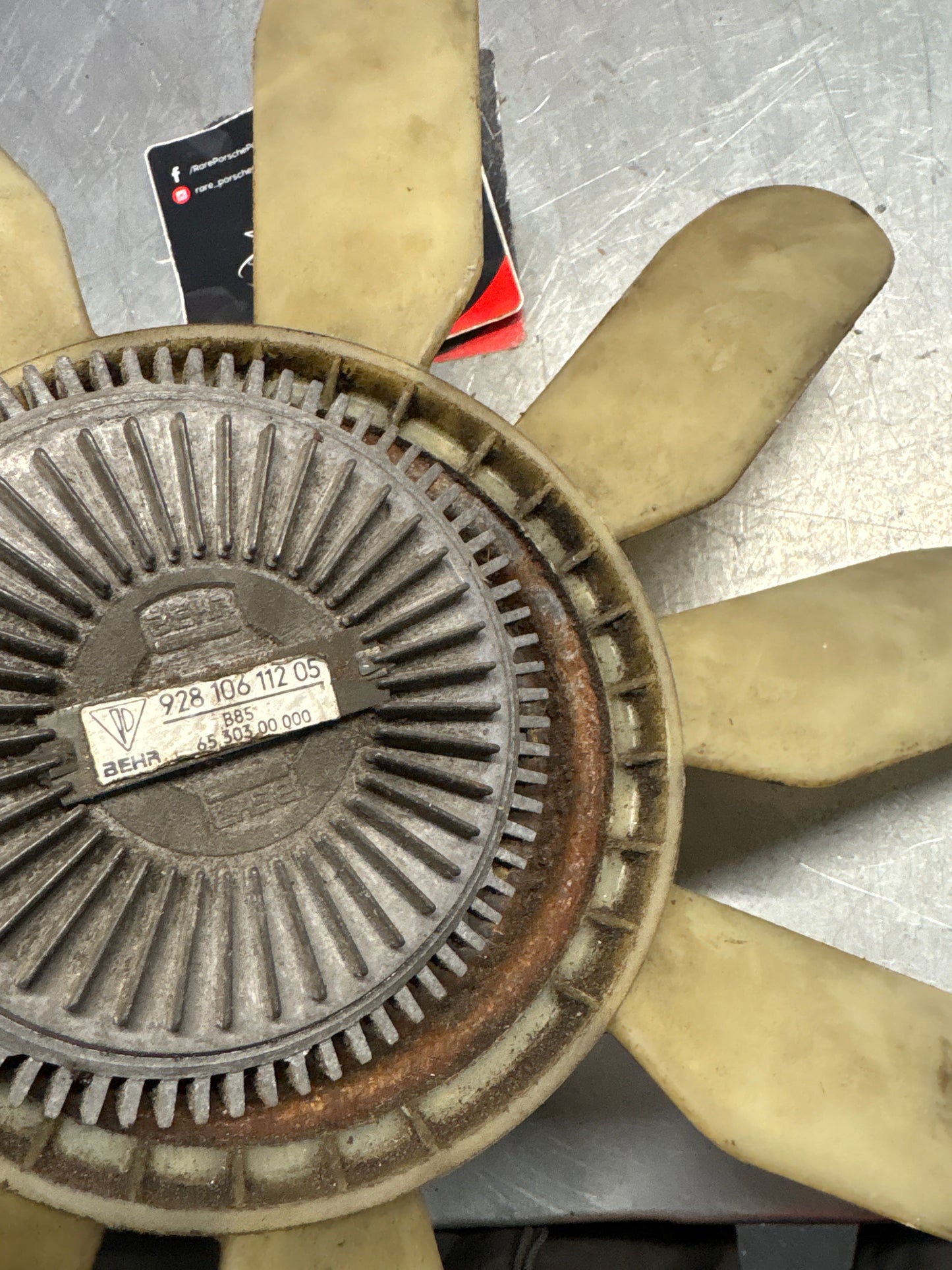 Porsche 928 late engine cooling fan clutch with bracket, used 92810611205 / 92810613701 / 9281061104R