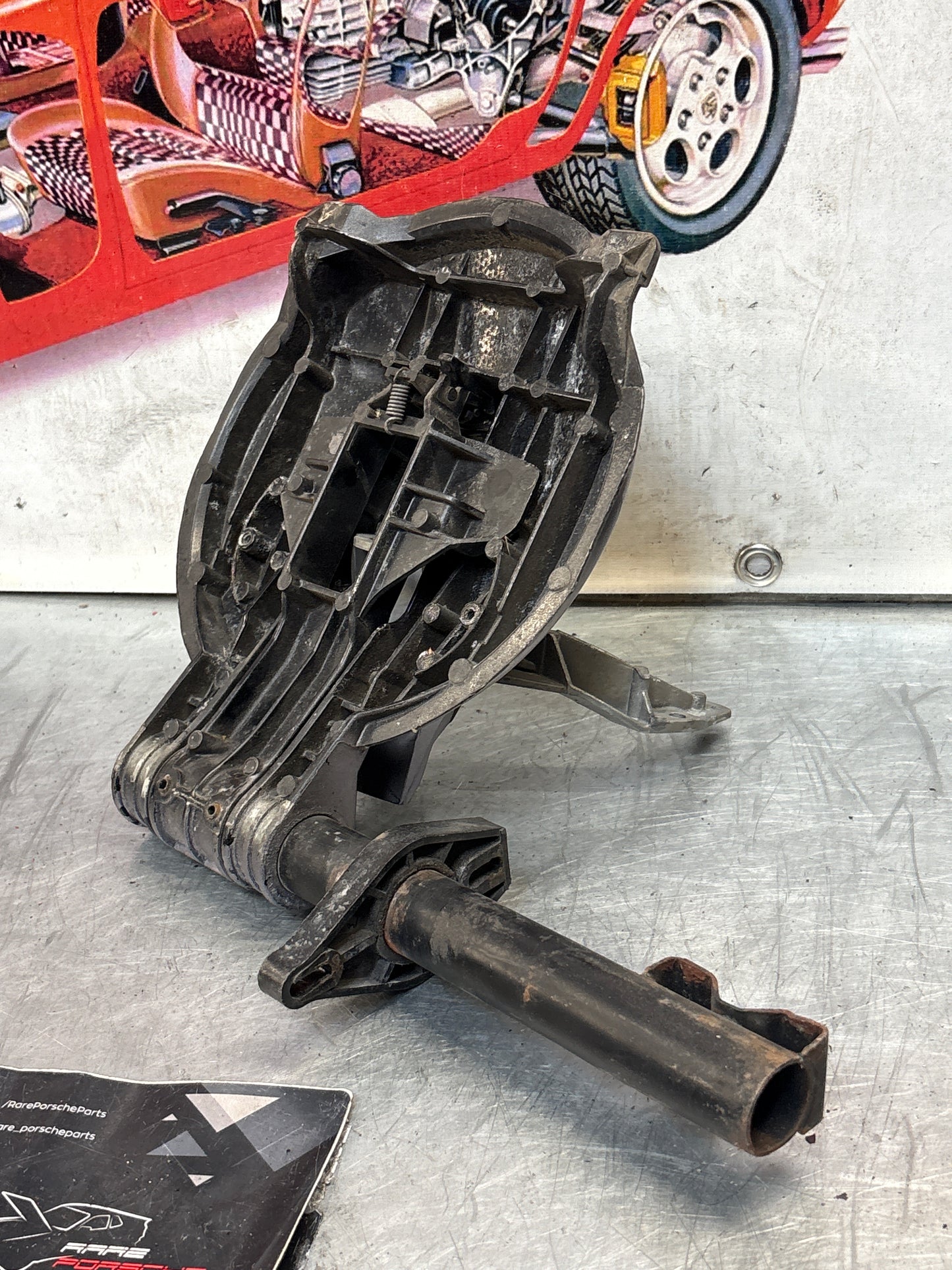 Porsche 928 right headlight swivel frame 92875024902 92875024302 used