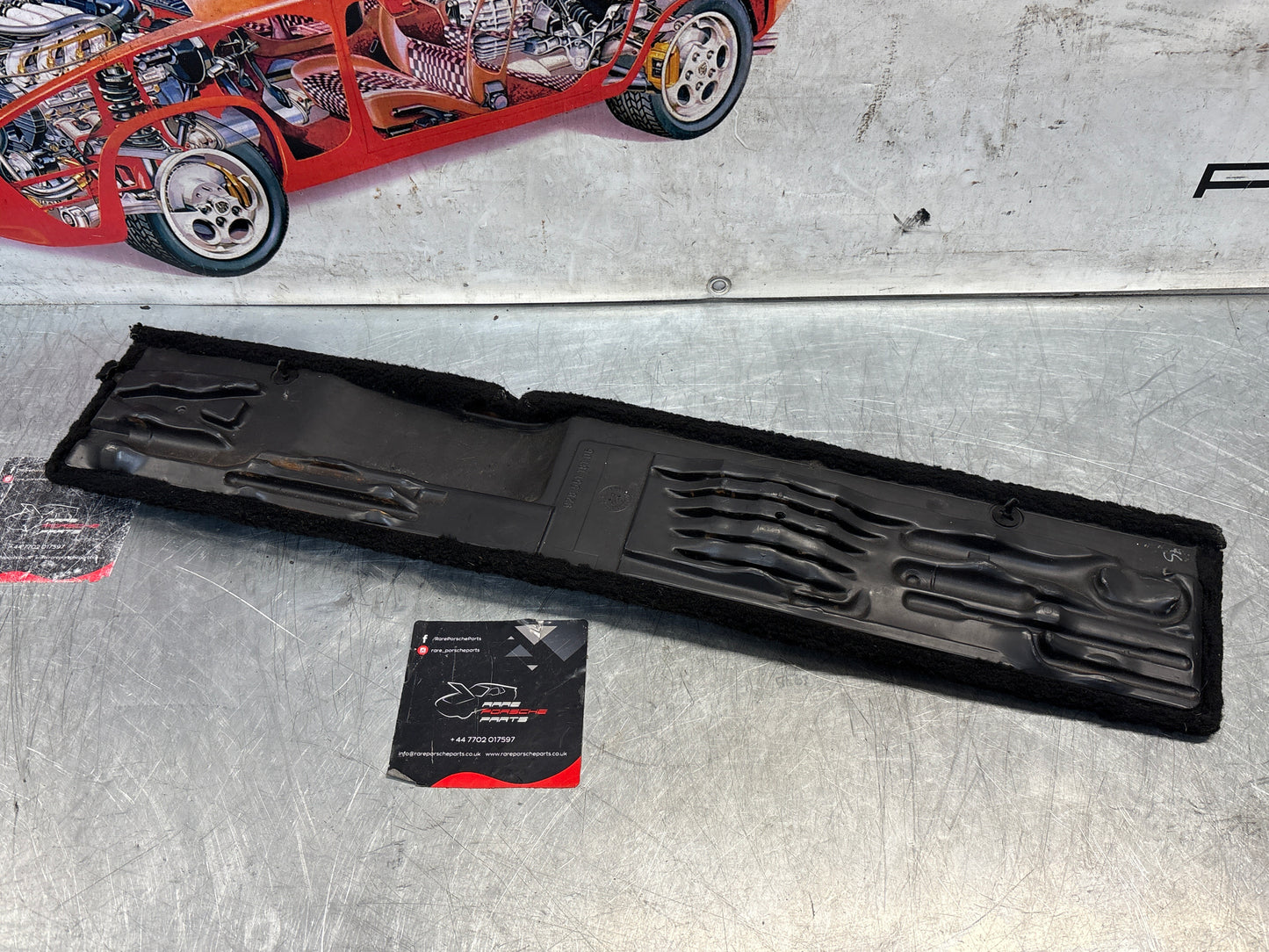 Porsche 928 black carpeted Tool kit panel cover, used 92855118106