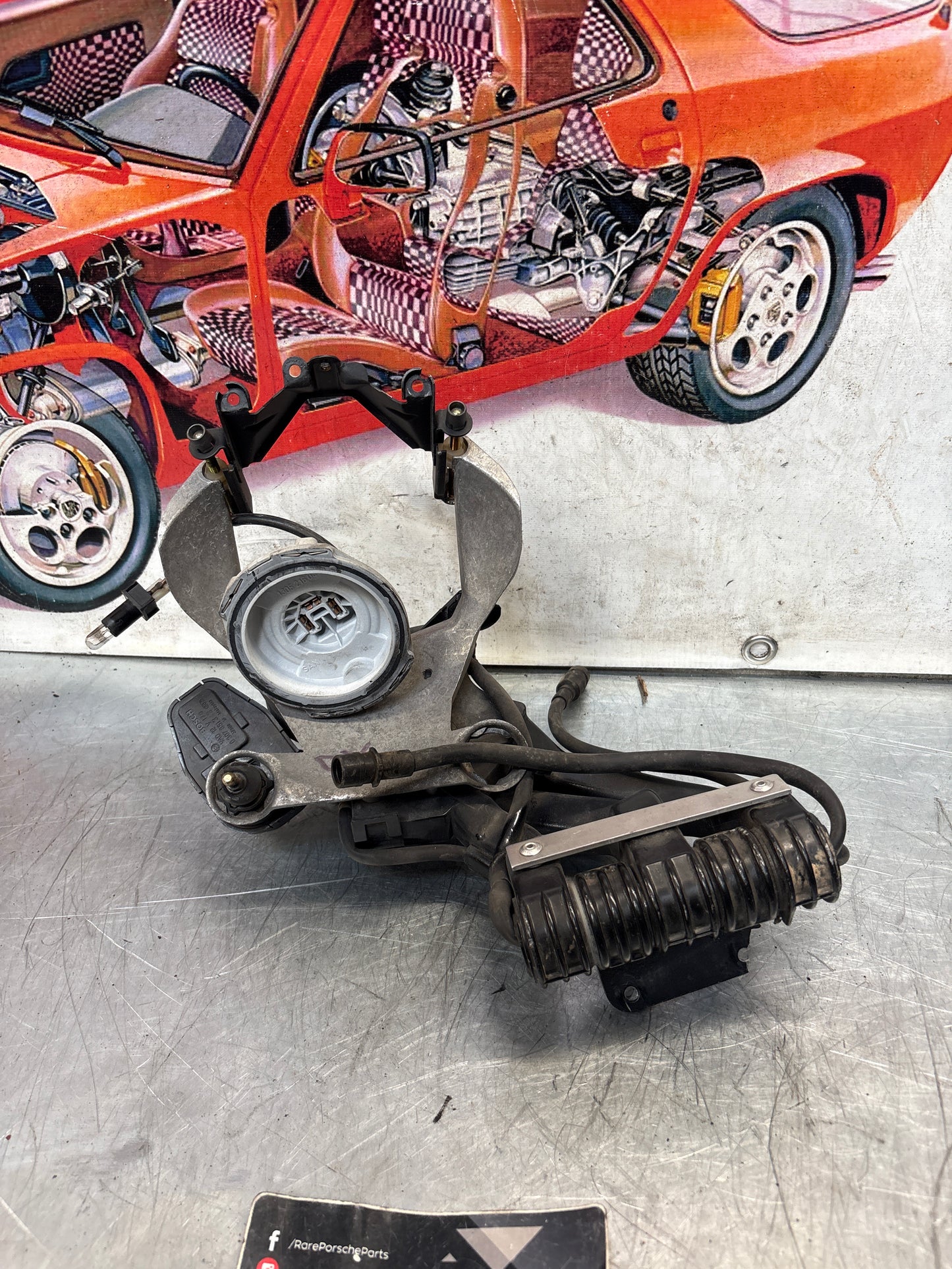 Porsche 968 right headlight swivel frame, for spares or repair 94475057200 / 94475057400 / 94475037800