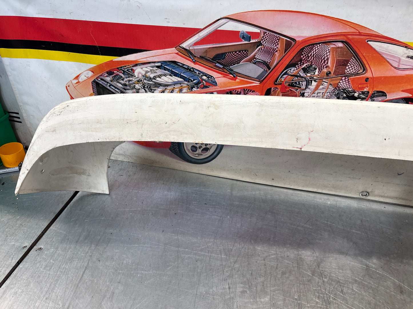 Porsche 944 rear bumper, NOS damaged 93150538700