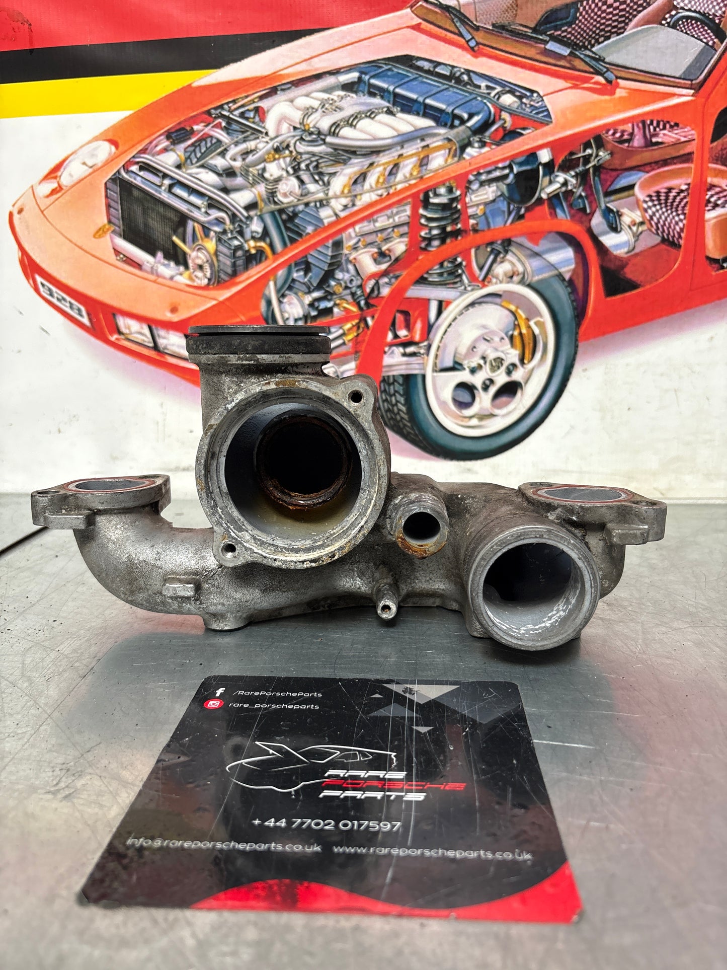 Porsche 928 thermostat housing, used 9281061652R