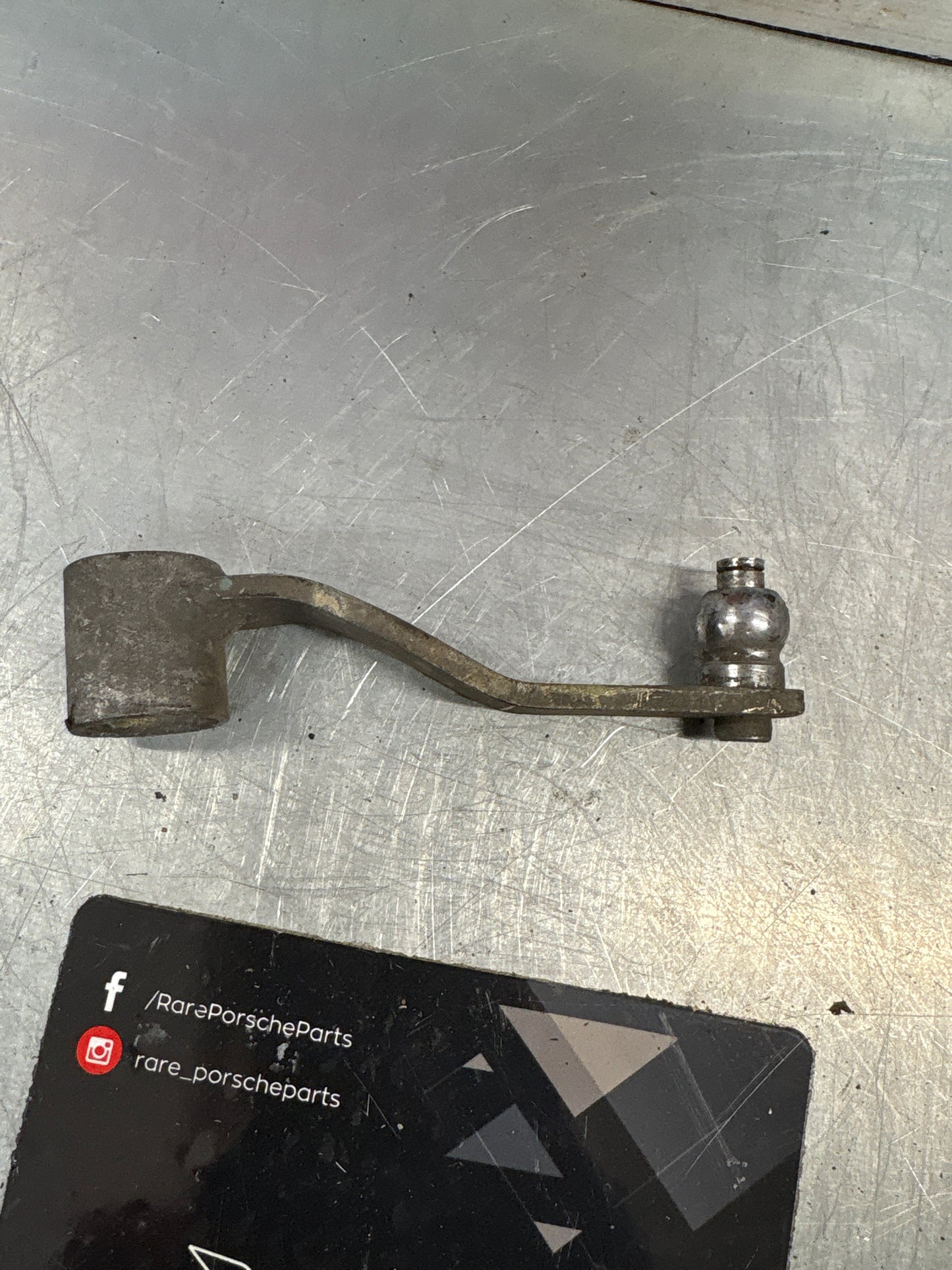 Porsche 924/944 headlight lever, used 477805651