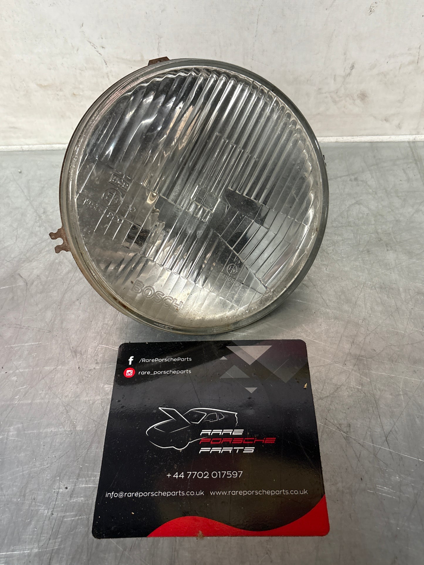 Porsche 924 / 944 Bosch H4 headlight, used 477941771 / 1305603018