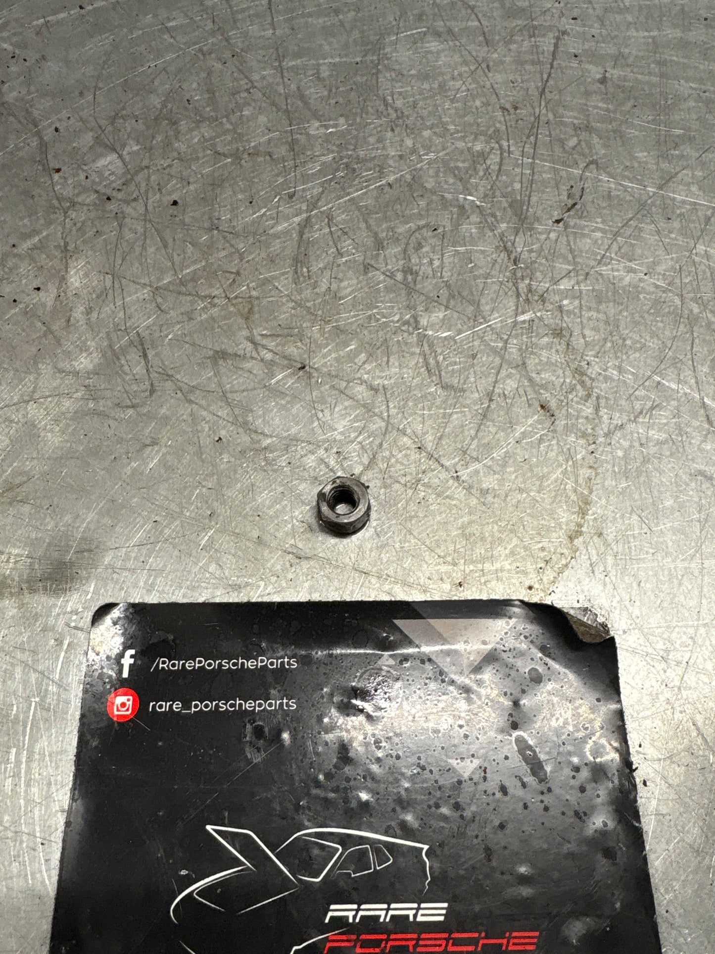 Porsche 928 air compressor strut nut, used 90008400403