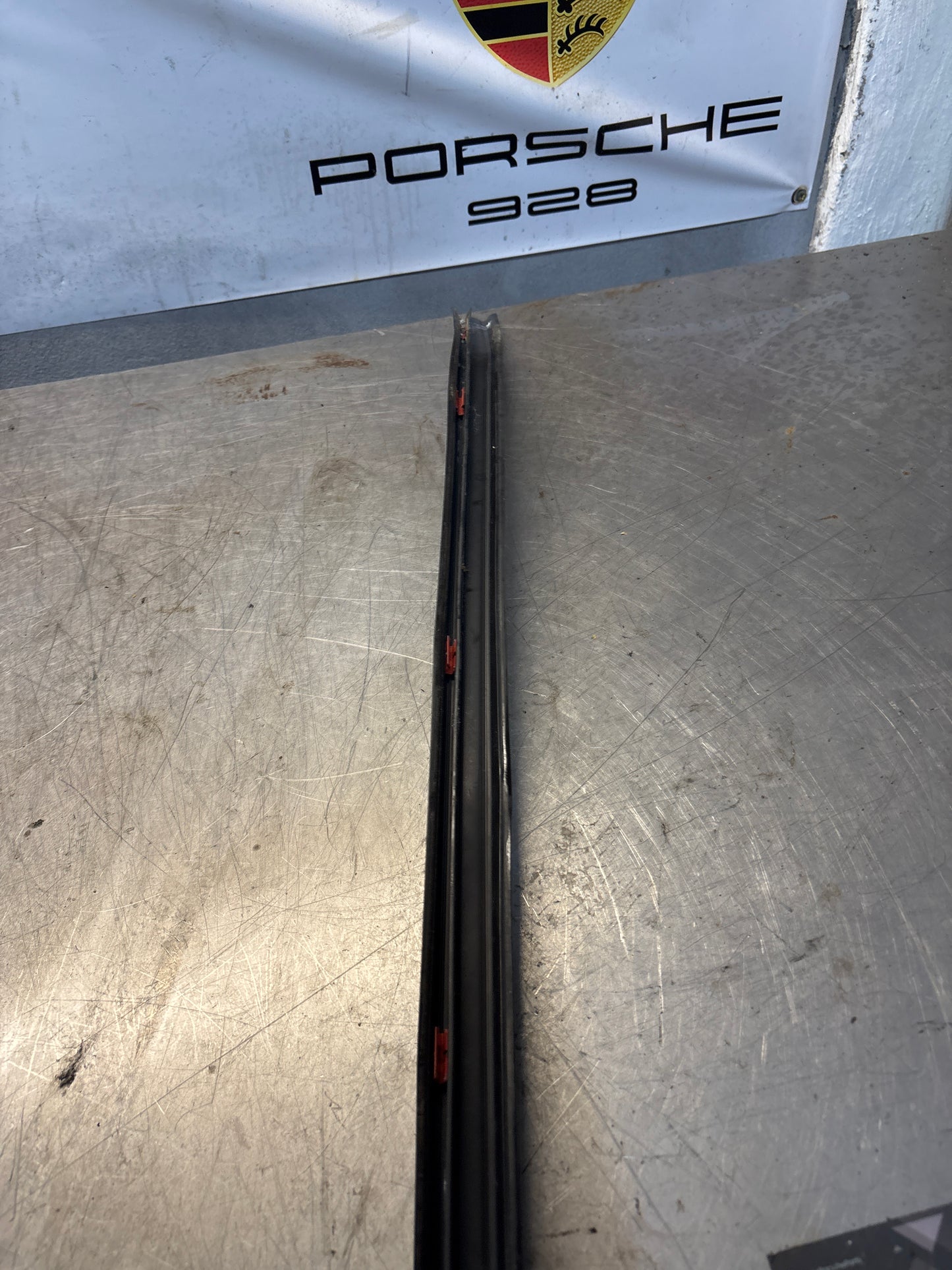 Porsche early 924/944 left sill trim, used 477853657A