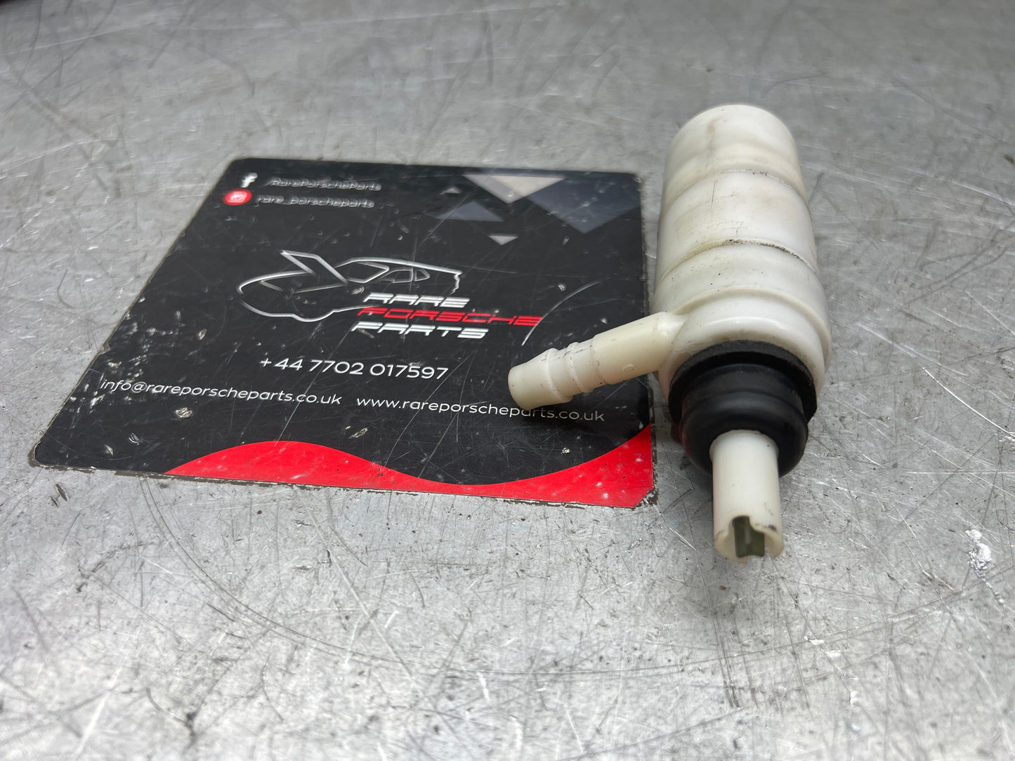 Porsche 924/944 Windscreen water bottle pump (used genuine) 357955681