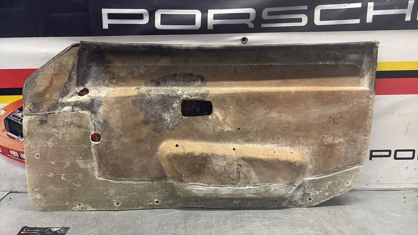 Porsche 924 / 944 early left manual Used door card, Porsche scripted brown, 477867011 no fabric!