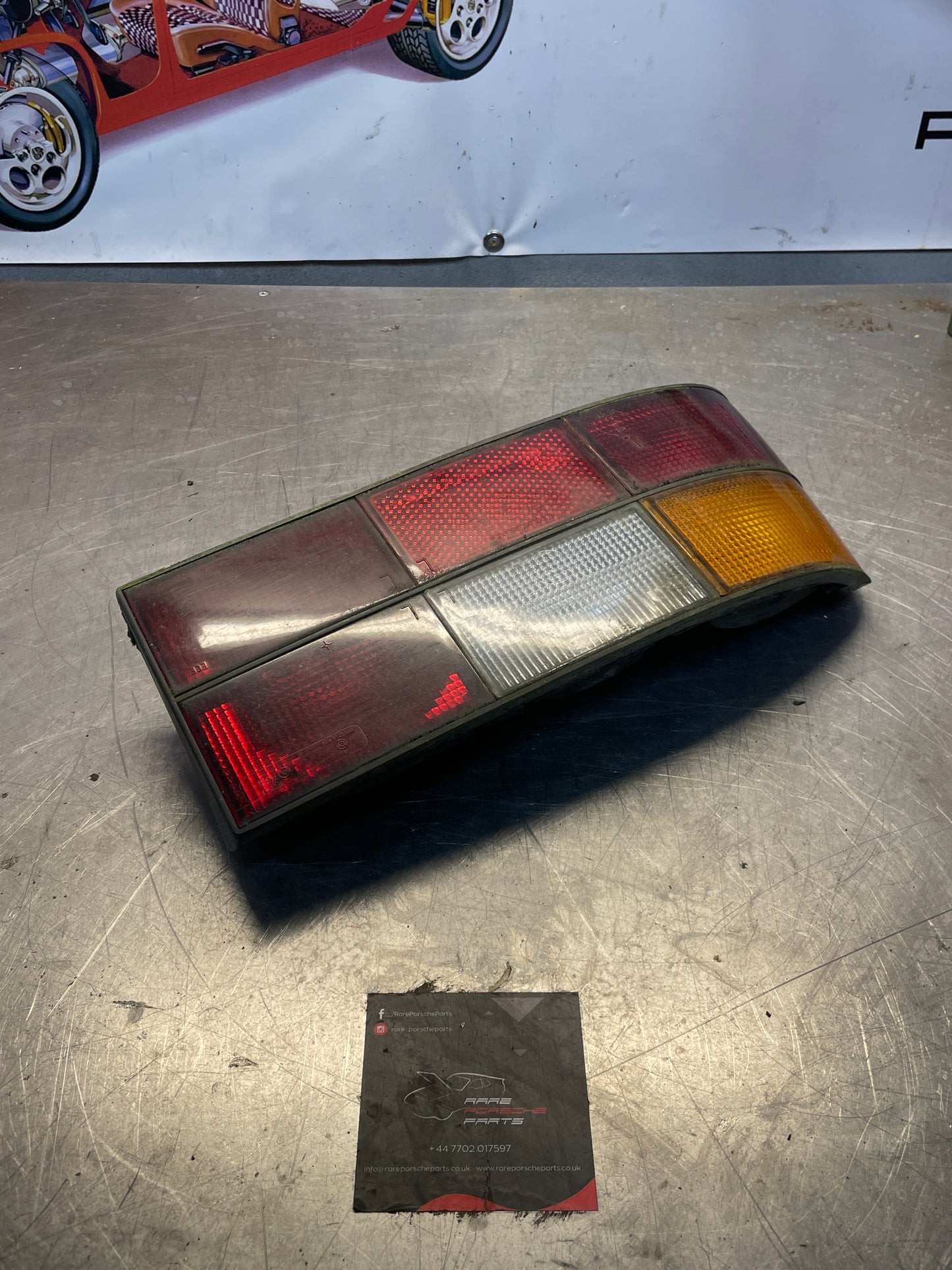 Porsche 924 / 944 left tail light, used