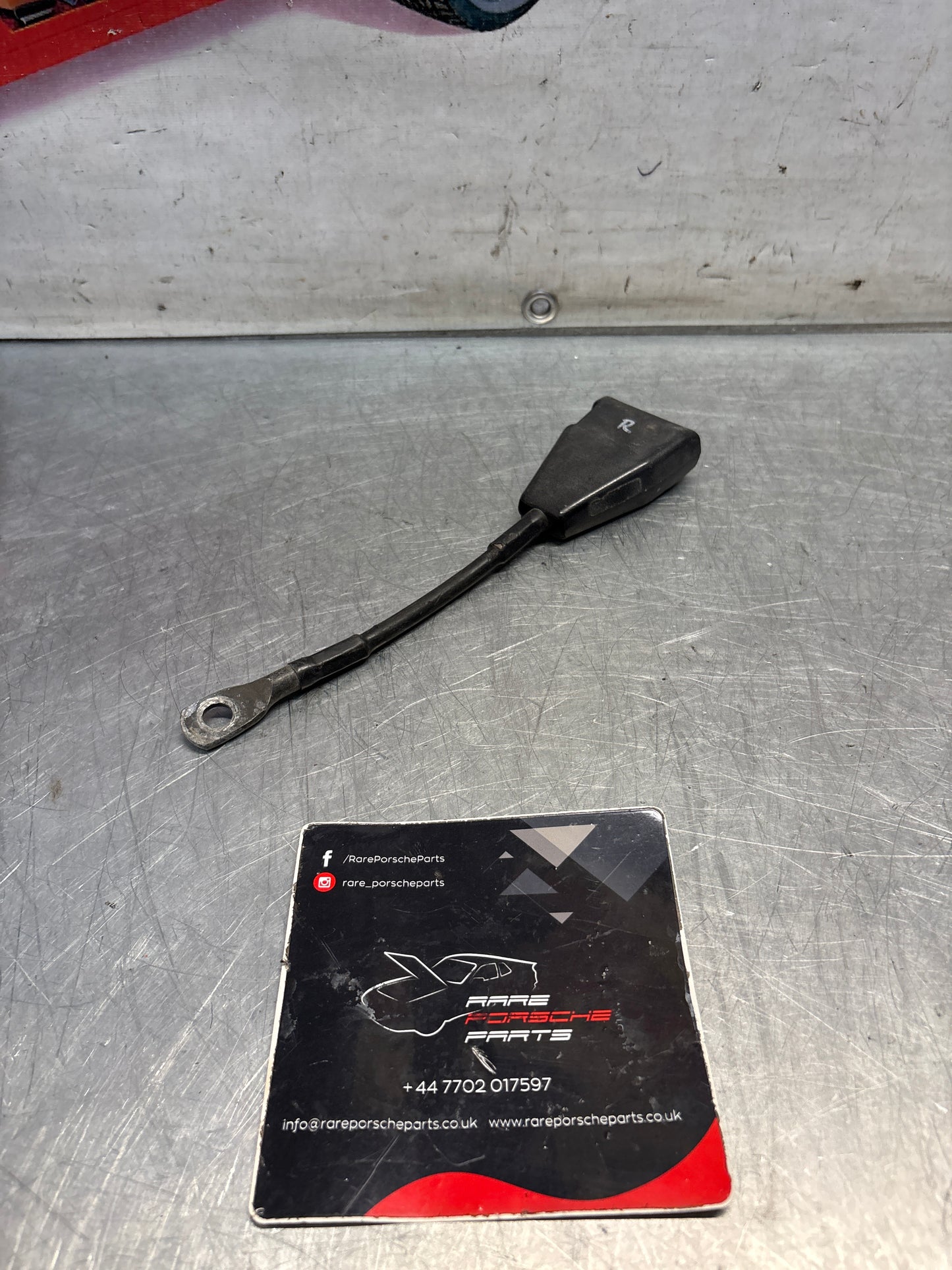 Used Porsche 924 early right seat belt anchor clasp retainer, buckle. 477857756D used