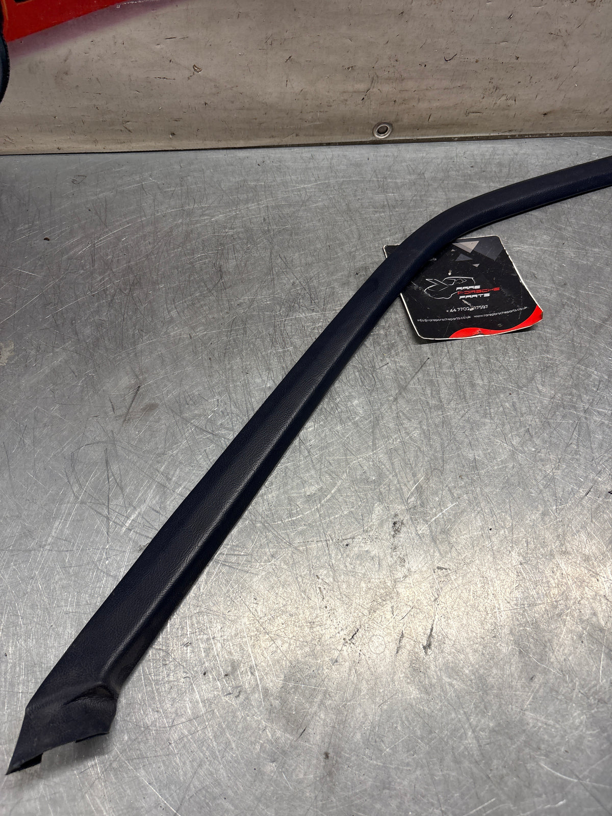 Porsche 928 right, off side door upper frame surround trim, marine blue 92855502602, used