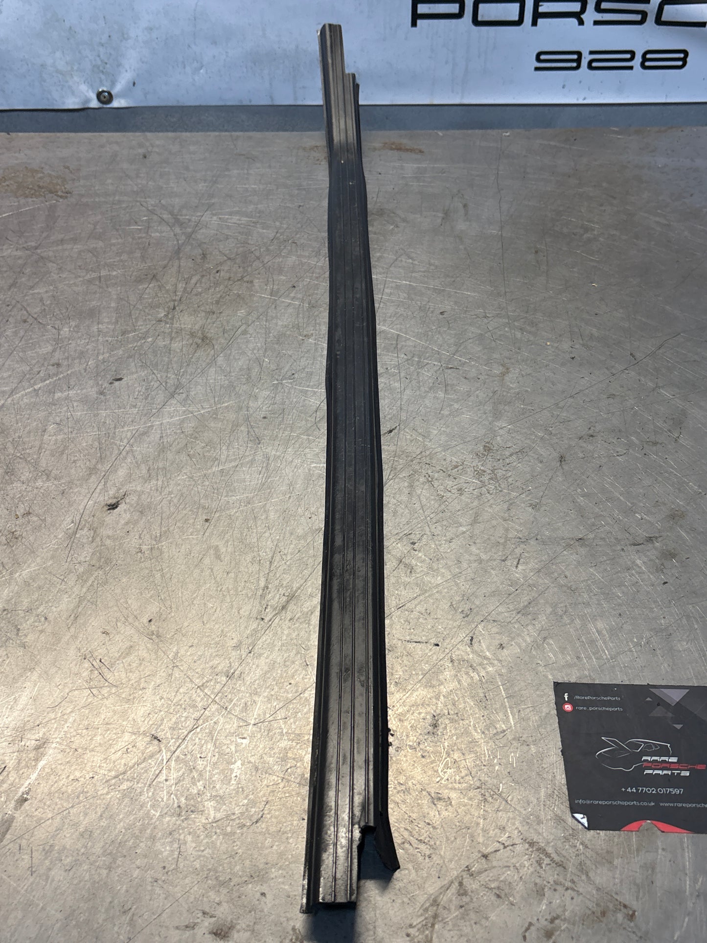 Porsche early 924/944 left sill trim, used 477853657A