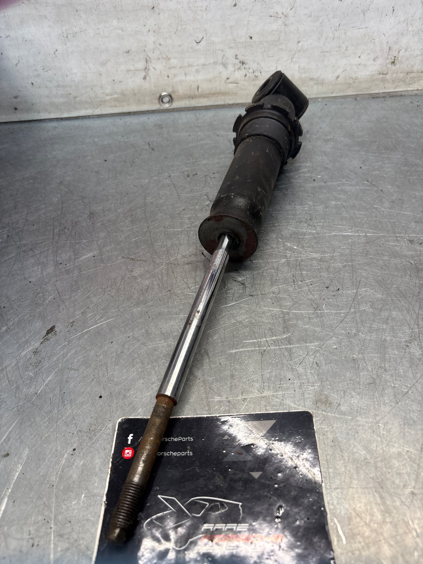 Porsche 928 rear shock absorber, used 92833305116