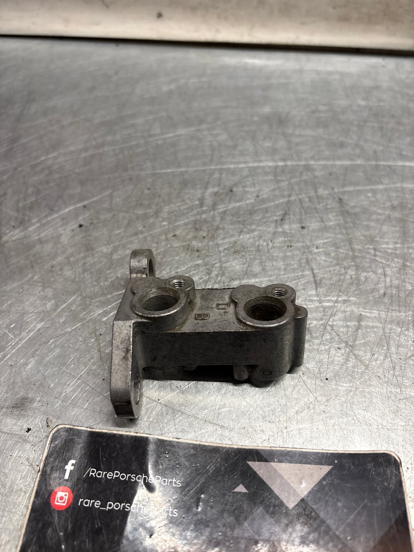 Porsche 944 flywheel sensor Bell-housing bracket, used 9441013212R