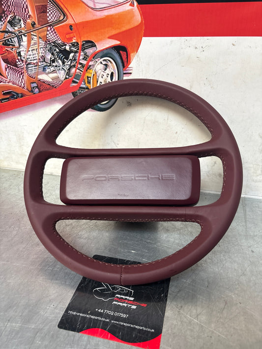 Porsche 944 burgundy steering wheel, used 94434708409