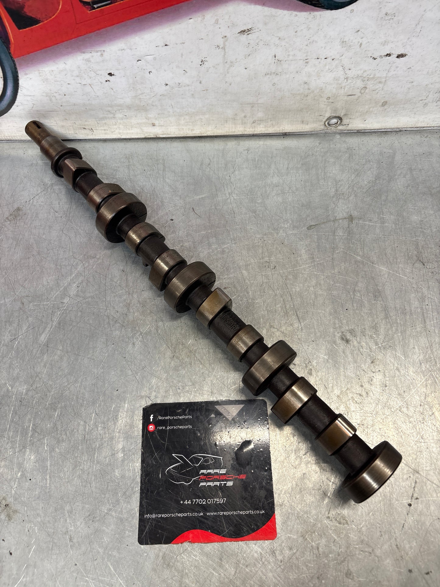 Porsche 928 cam shaft, used 9281051553R