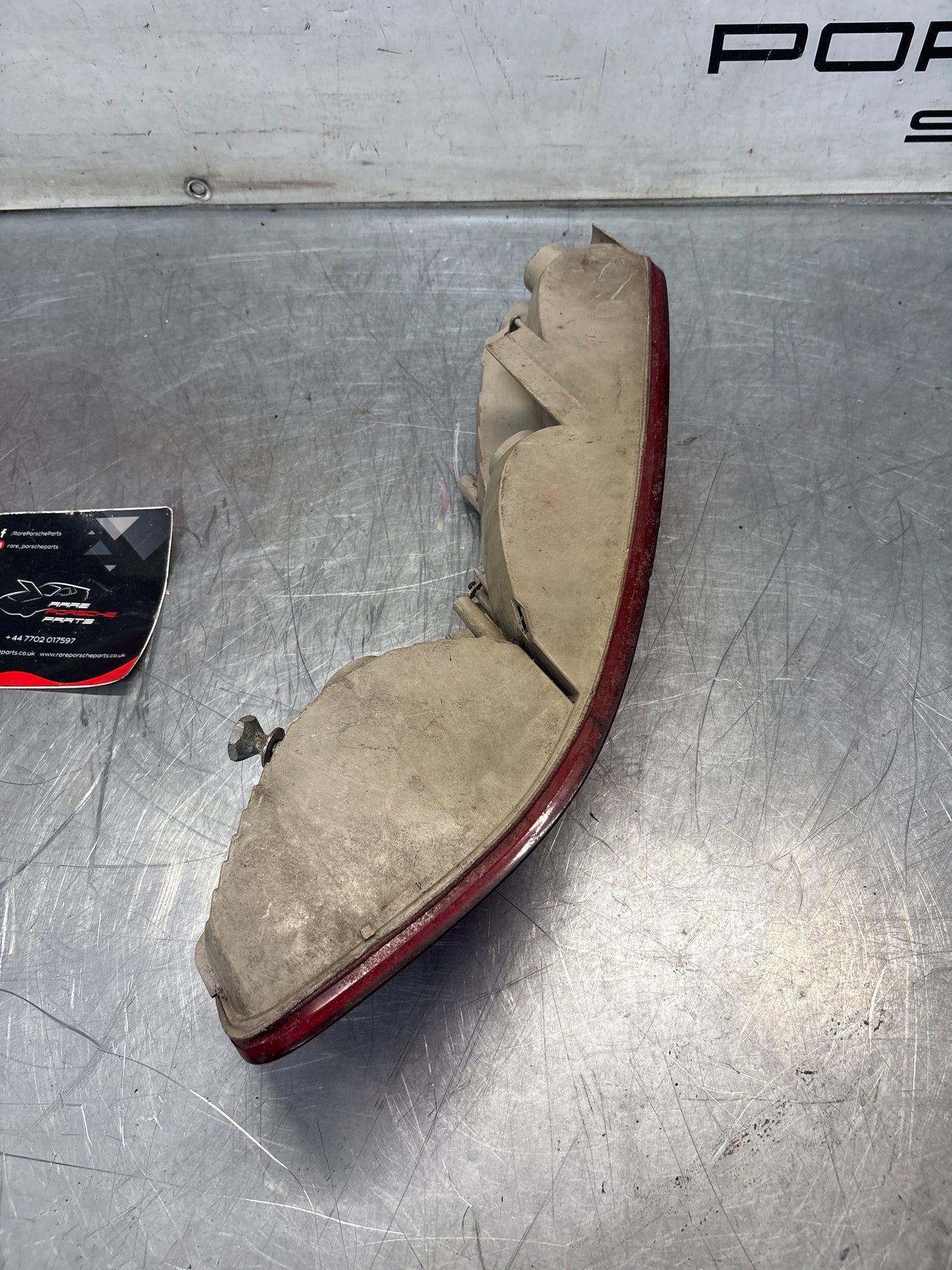 Porsche 928 rear left tail light, used, 92863104300