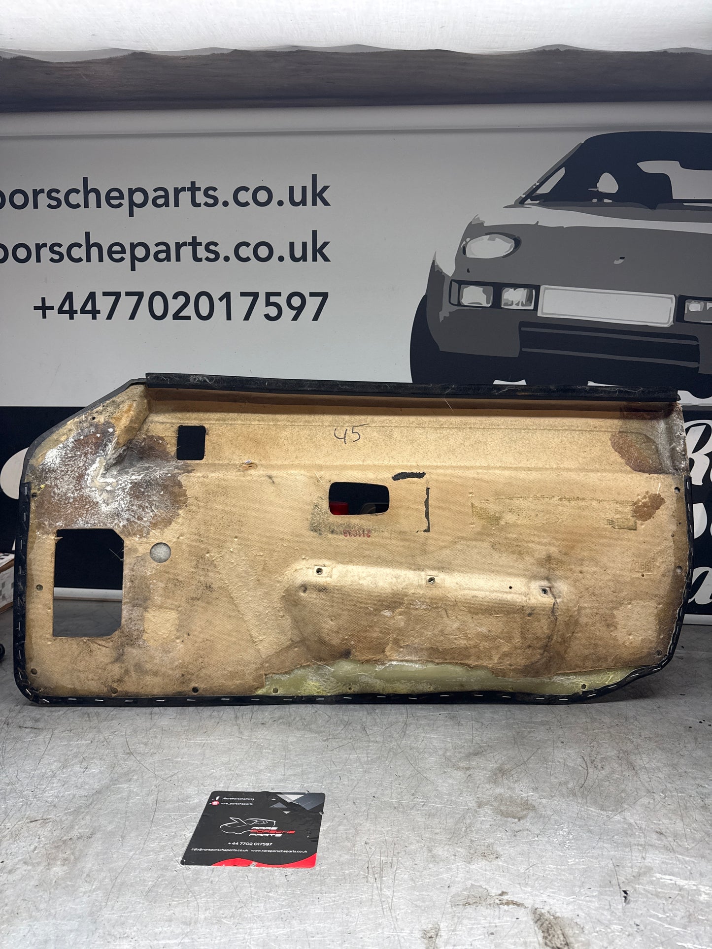 Porsche 924/ Early 944 black RHD Left door card. Fibreglass repaired. 477867012