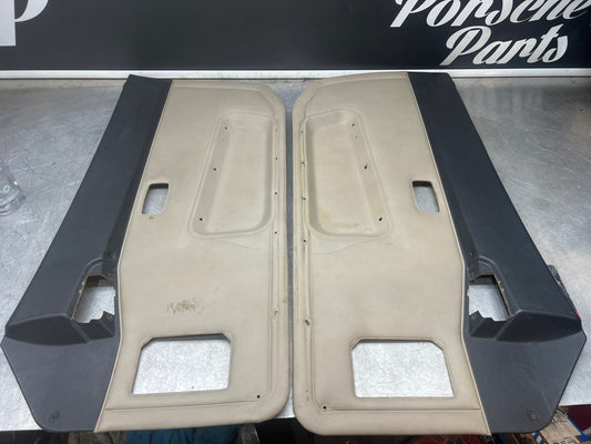 Pair Of Porsche 944 black / cream / white door cards 94455501701 94455501801 used, nice condition.