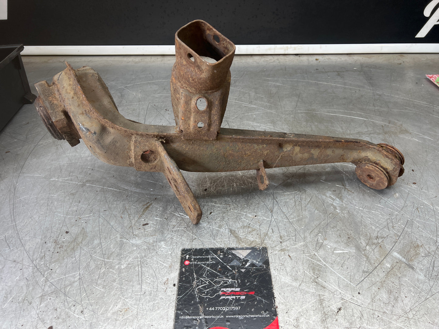 Porsche 924 944  -85.5 Rear left trailing arm, 94433102100