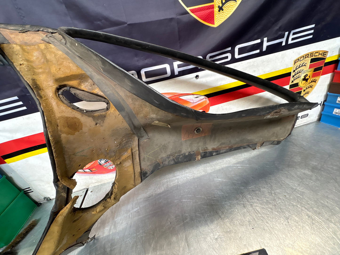 Porsche 928 early left side lower side trim panel, without loudspeaker, black used 92855502102