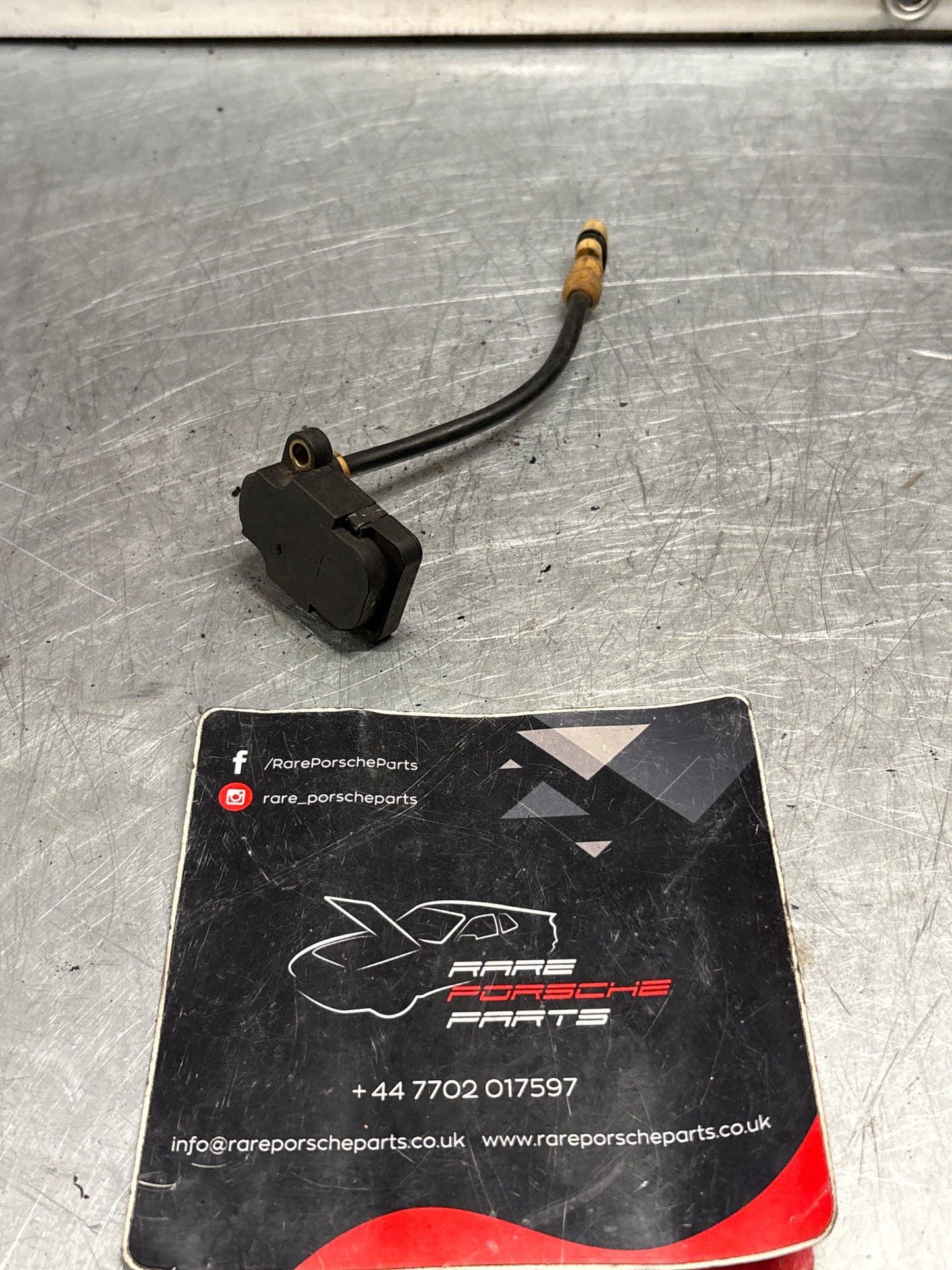 Porsche 928 S4 Tire pressure sensor, used 92860641400 / 0335569987