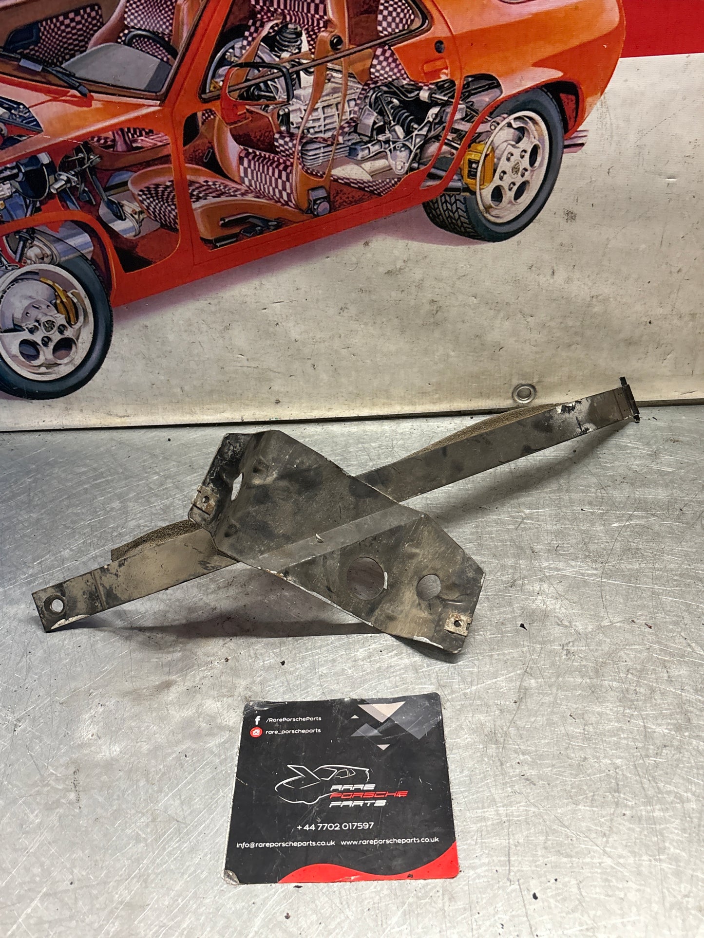 Porsche 944 S2 / Turbo 90- left fuel tank restraining strap, used 95120131502