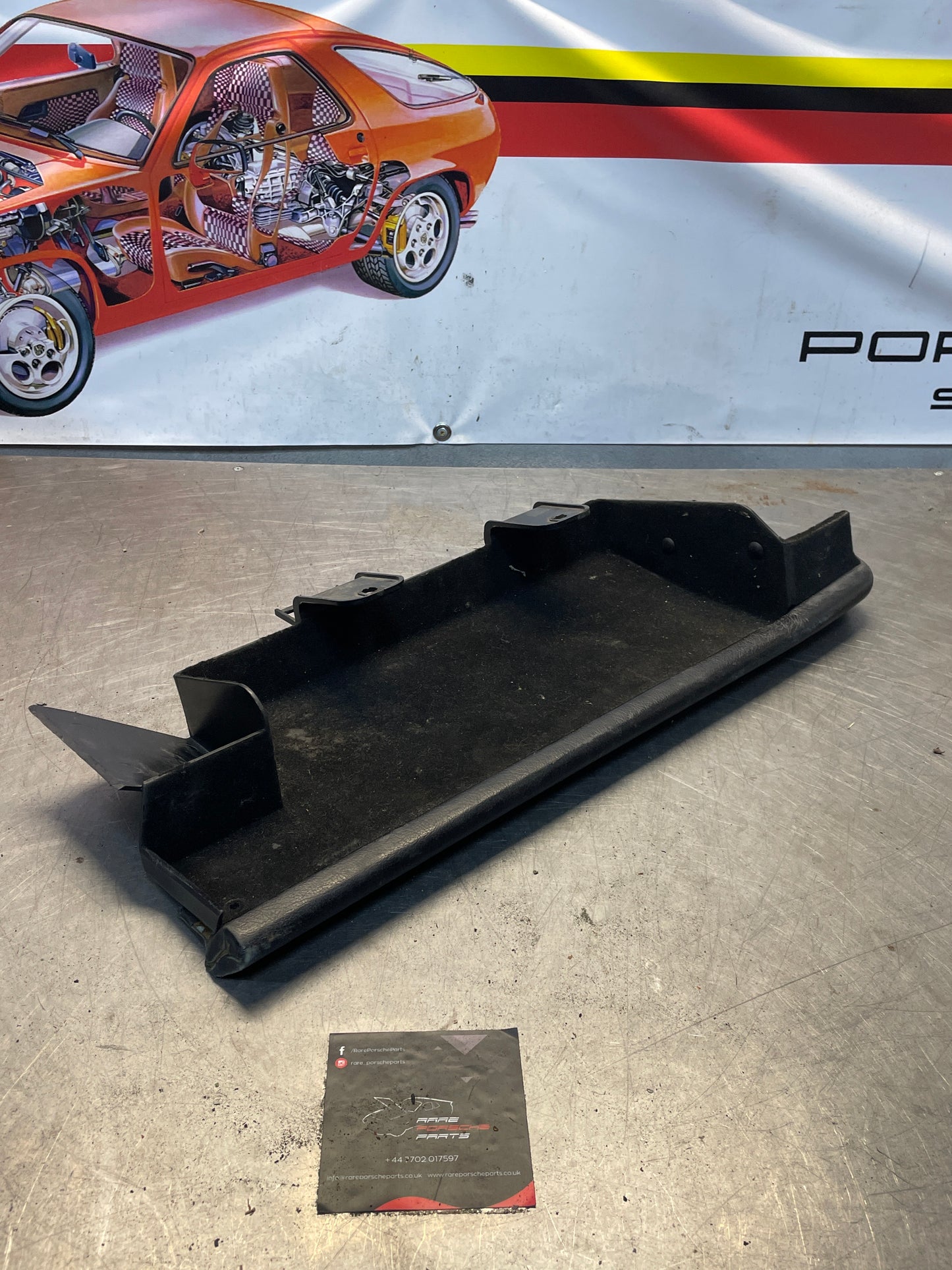 Porsche 928 under glove box shelf, black 92855207702 LHD only, used