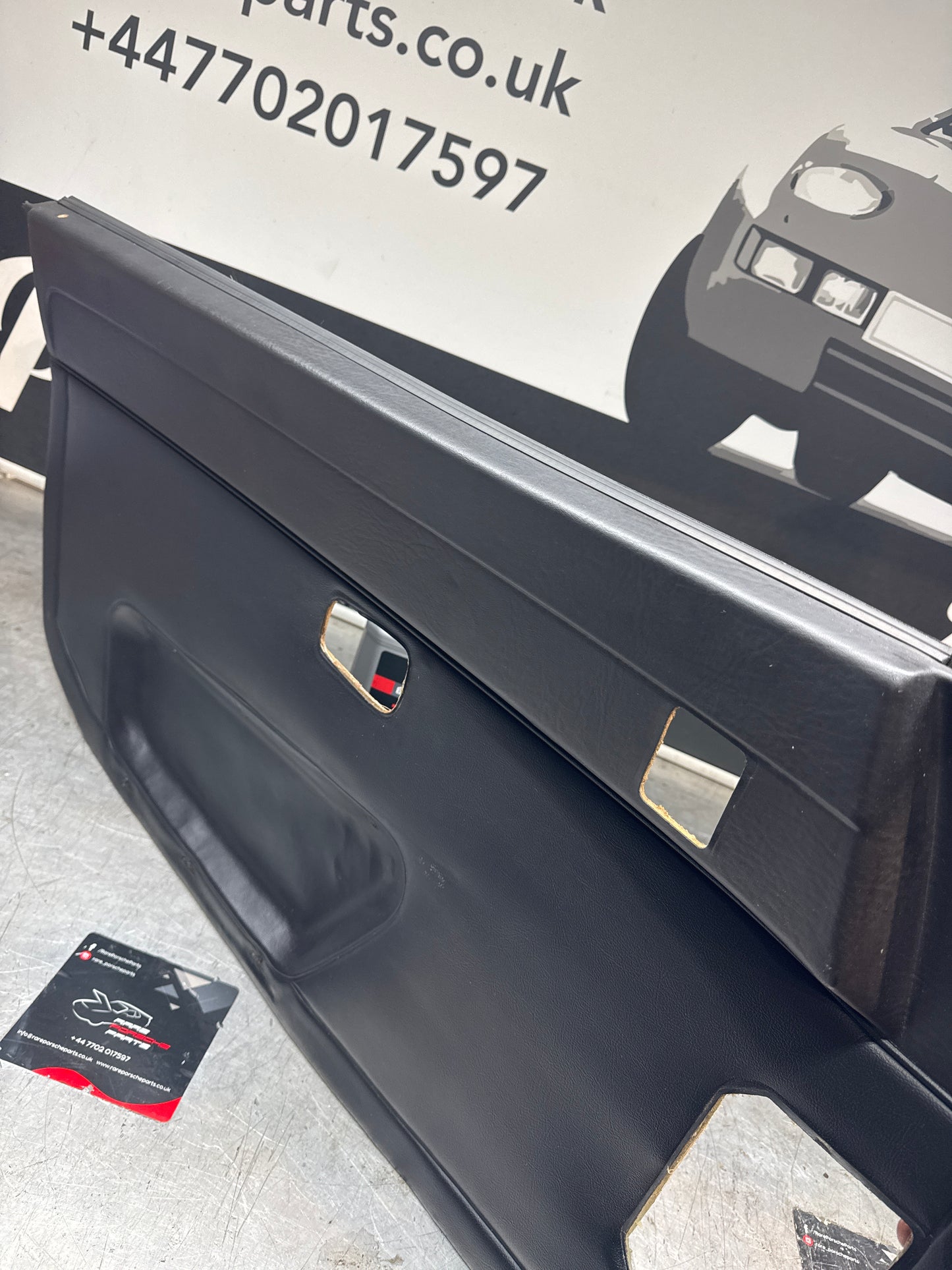 Porsche 924/ Early 944 black RHD Left door card. Fibreglass repaired. 477867012