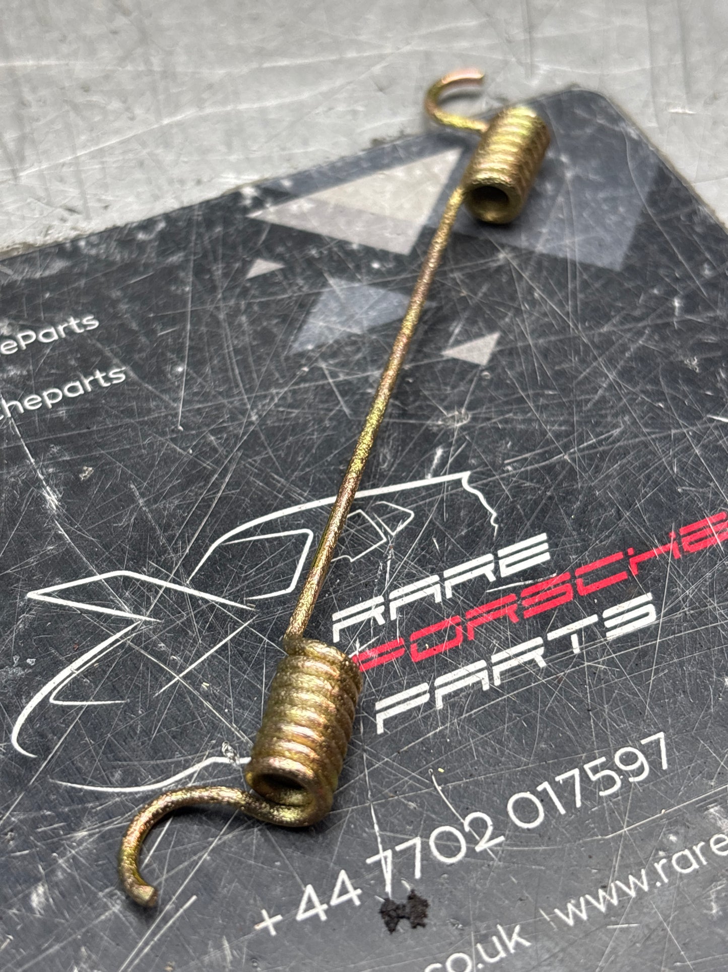 Porsche 928 924 944 911 handbrake shoe return spring, refurbished 90135295410, 477609463