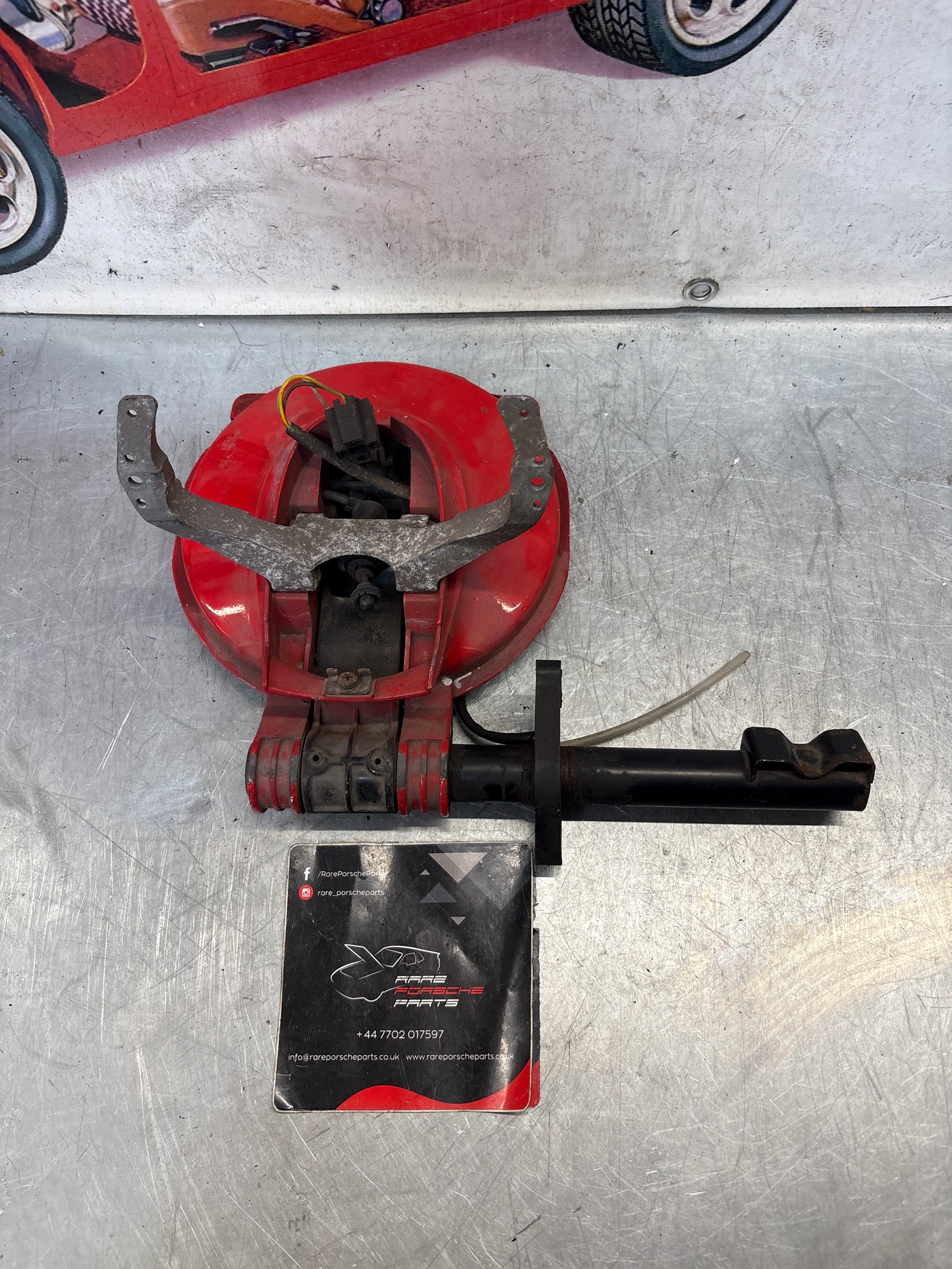 Porsche 928 left headlight swivel frame 92875024902 92875024302 used