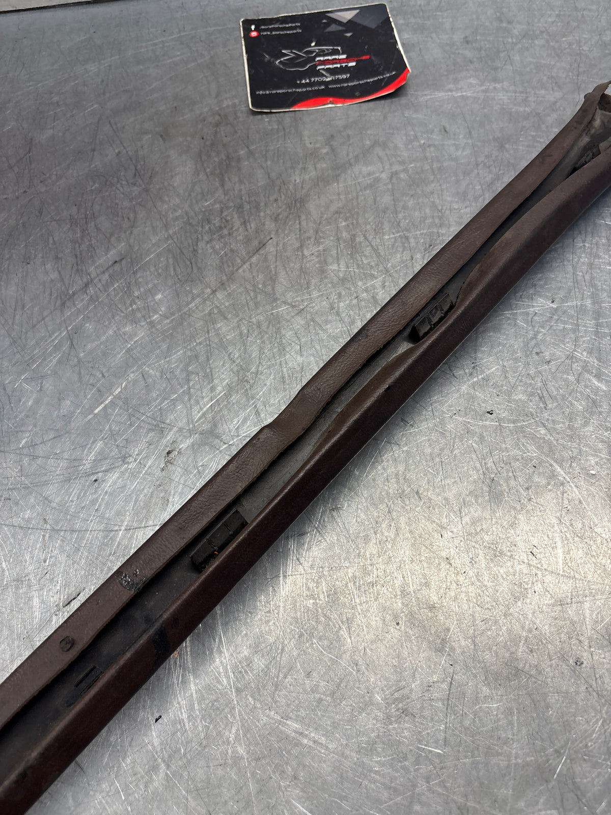 Porsche 928 tailgate trim, left, near side, brown, 92855503702, used