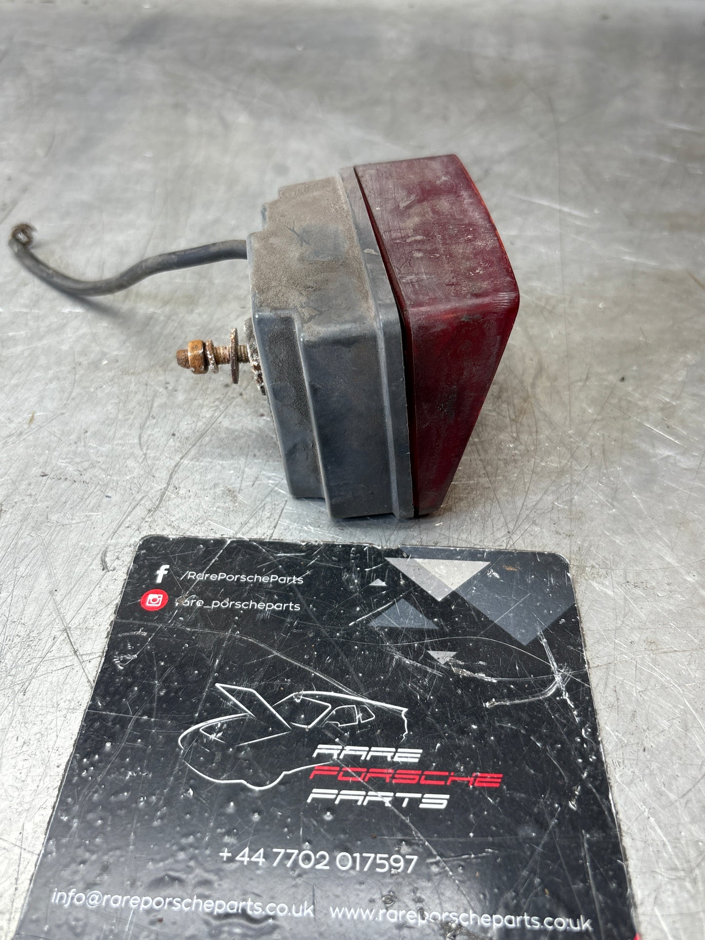 Porsche 928 left rear fogliht, used 92863142801R / 92863142701L spares or repair