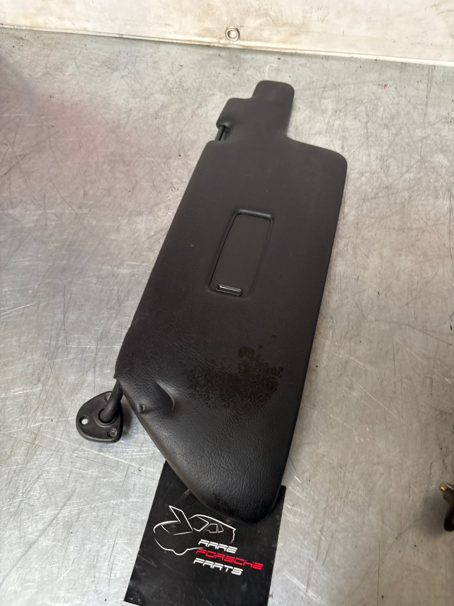 Porsche 944 left sun visor with mirror, Black, used 94473103101