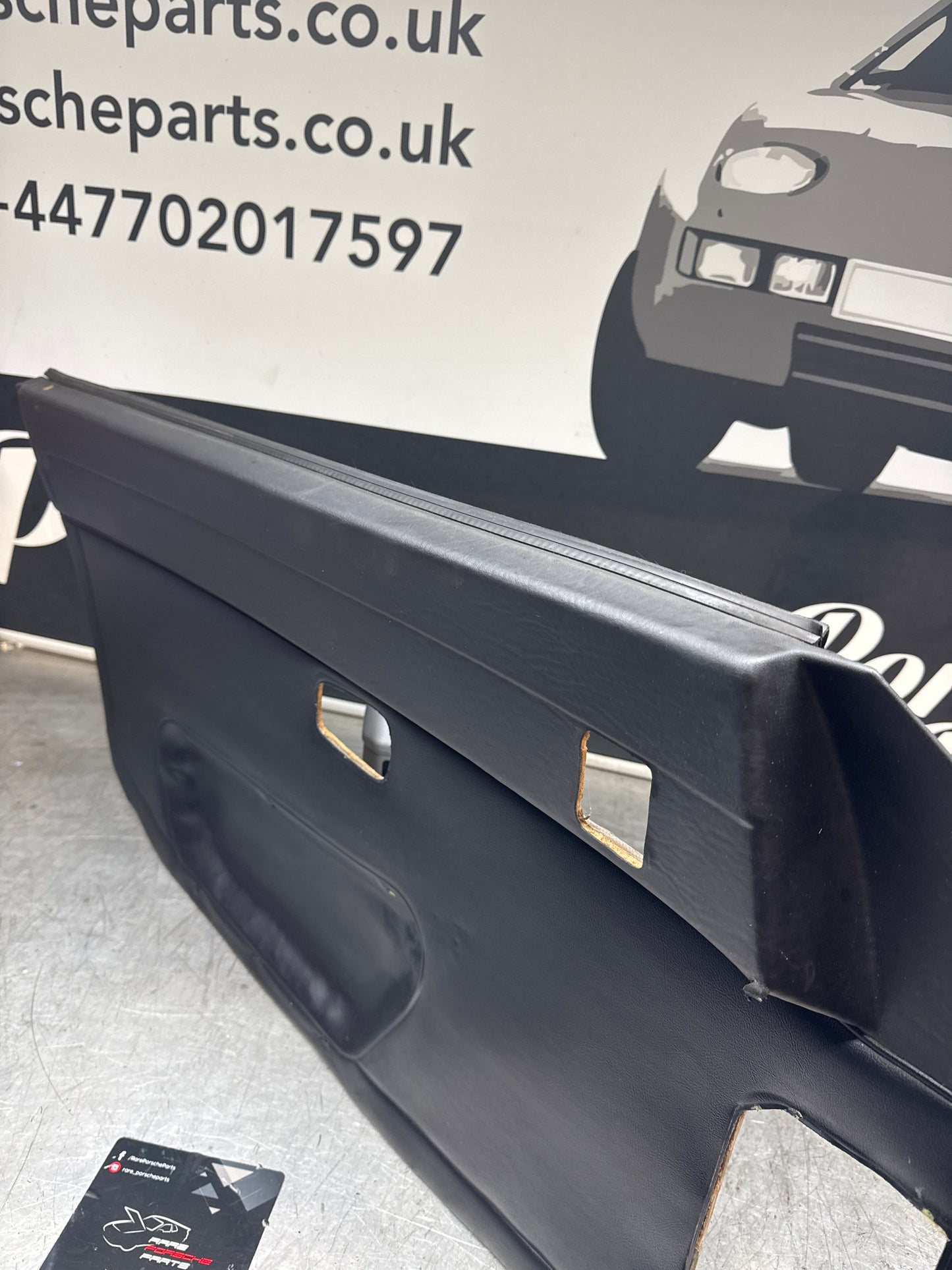 Porsche 924/ Early 944 black RHD Left door card. Fibreglass repaired. 477867012