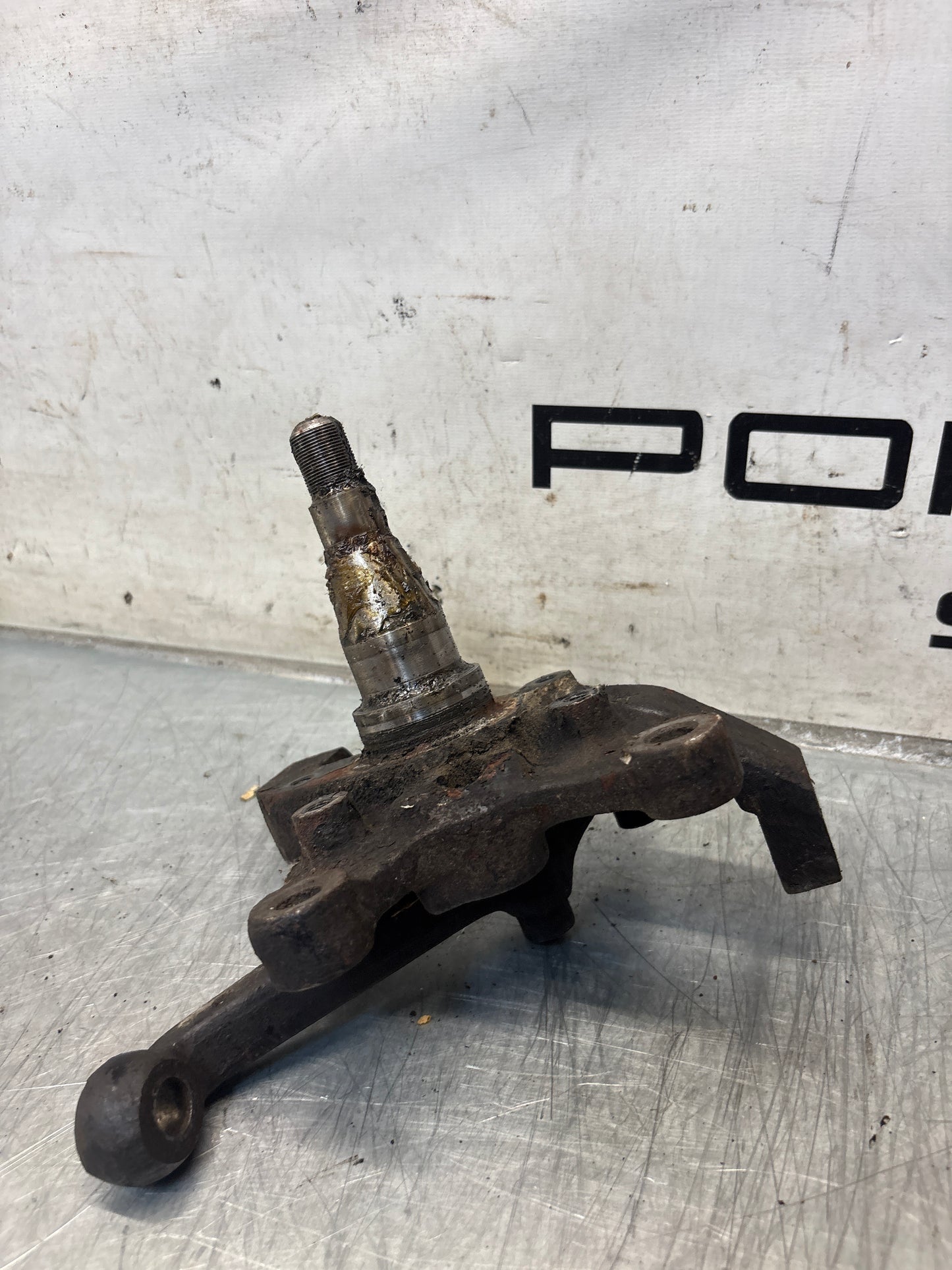 Porsche 928 left steering spindle knuckle, used 92834105703